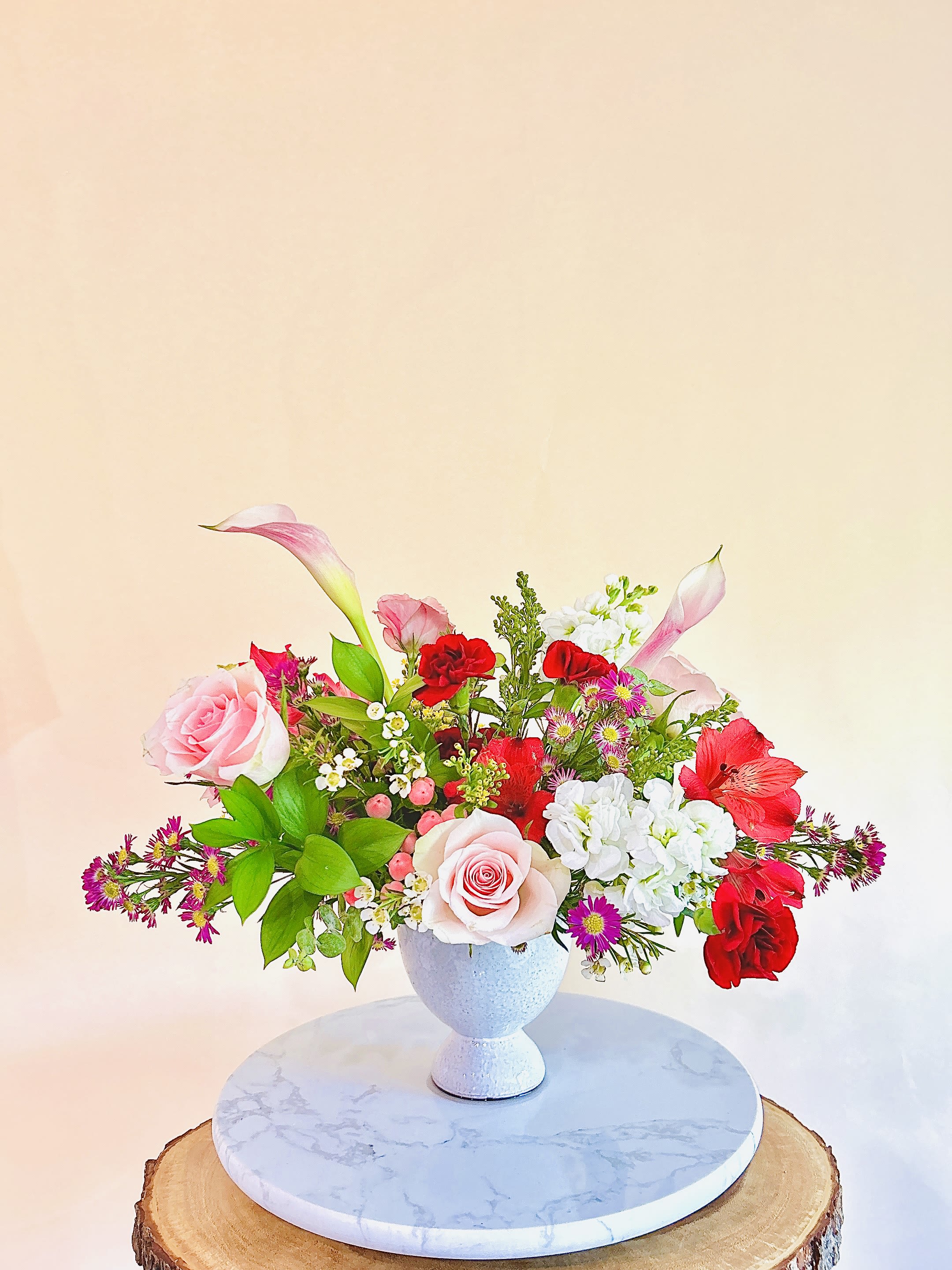 Sweetheart - Please keep in kind that no arrangement can be made identical to the photos shown (as some flowers are seasonal). Therefore, we will substitute them accordingly with in-season flowers instead. We will do our absolute best to arrange the flowers as similar as possible with the photos shown!   For Bouquets, we DO NOT include vases unless you add one.  For Vased Flowers, we include vases.   Arrangement description: The word “adorable” suits this bouquet. This bouquet is arranged with some elegant blooms such as lisianthus/ butterfly ranunculus/ astilbe. The filler flowers in between blooms make the bouquet look more lovely. The flowers may vary but style and color scheme will be maintained.   Right now, you can expect summer blooms sourced from local farms.   We use small ordinary 4in by 3in cards. If you want to send flowers with a special messaging card, please choose one from add-ons!  Delivery: our standard delivery time window is between 3:00pm and 5:00pm.   If you have any questions regarding the order, please feel free to contact us!   Email: agapeflower.studio25@gmail.com  