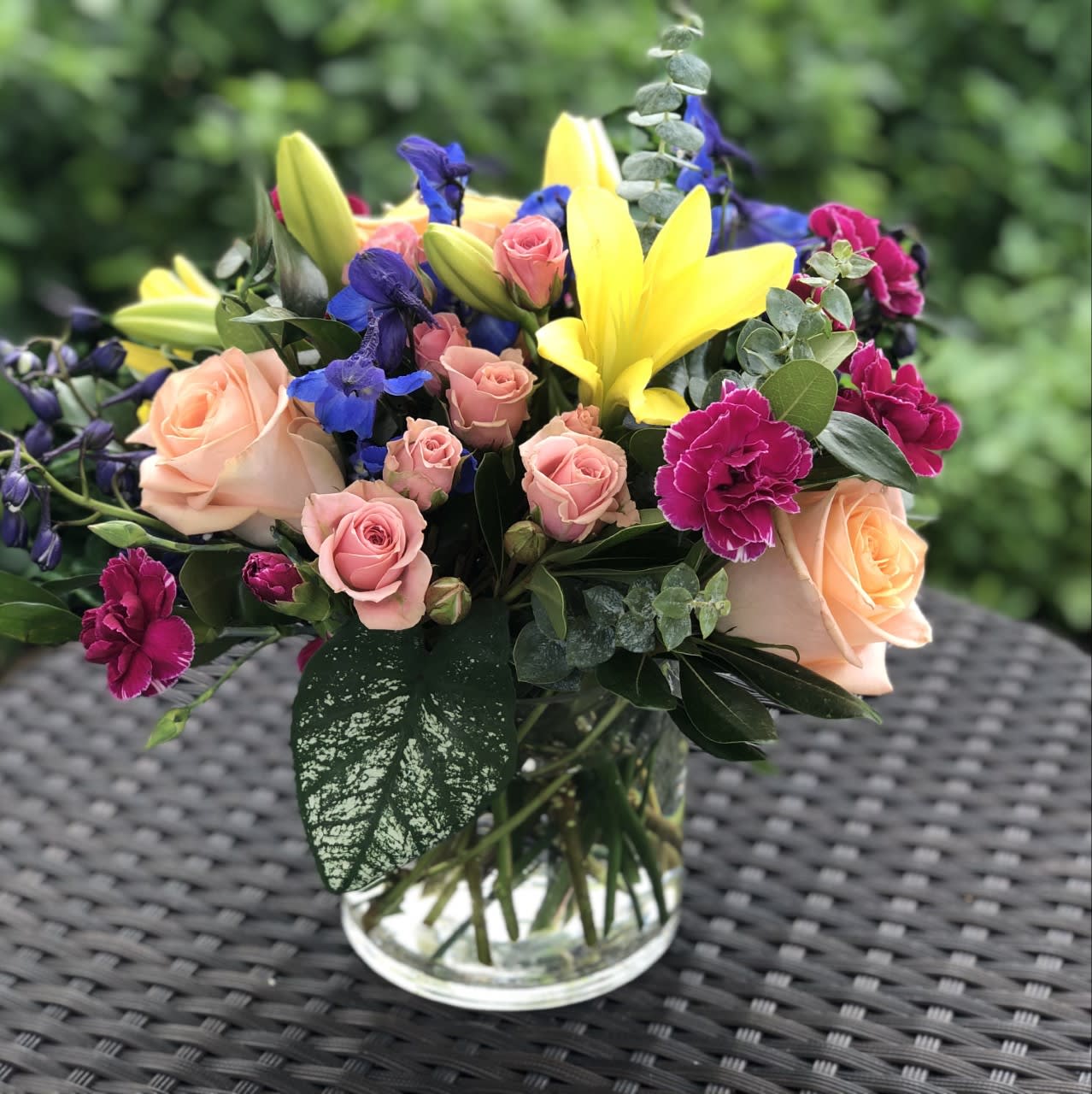 Naples Garden Party Naples Garden Party - A little this, and a little that... This arrangement will include a mixture of assorted flowers with a natural garden inspired design.