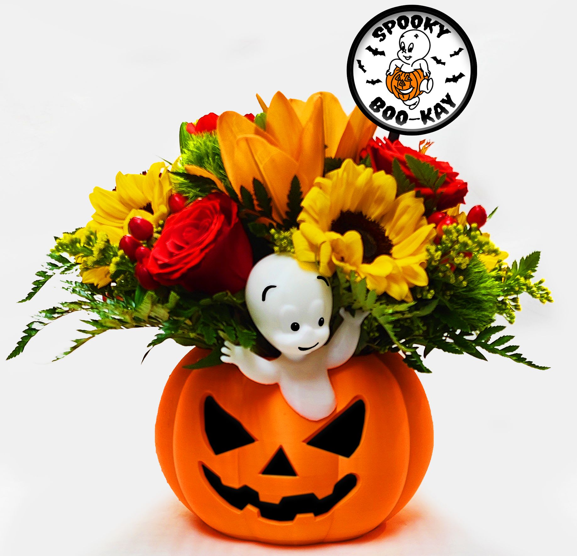 Spooky Boo-kay Spooky Boo-kay - Throw back to your childhood with everyone's favorite ghost Casper. Casper poking through this beautiful pumpkin arrangement makes for a spooky holiday table piece.