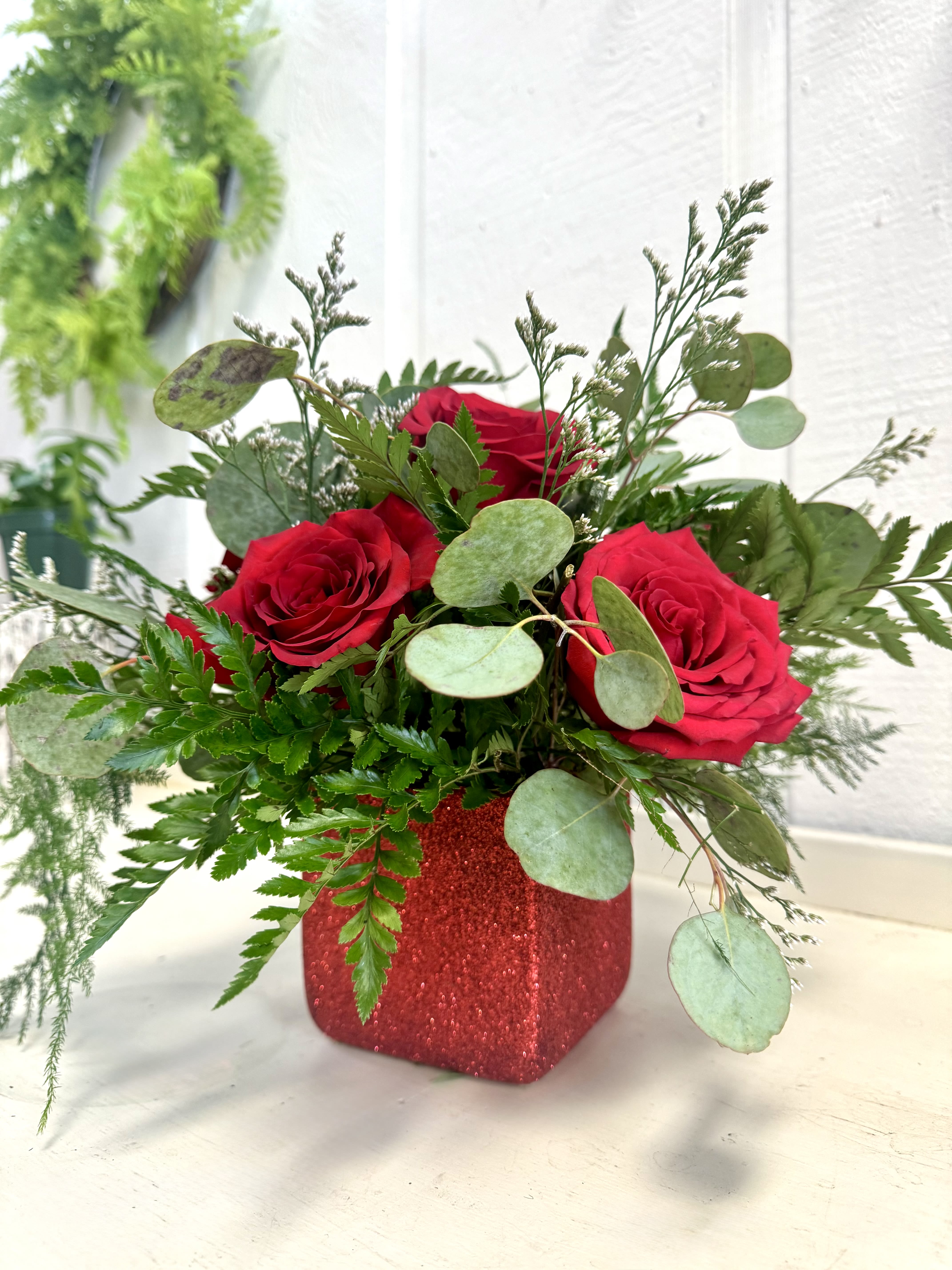 1/2 Dozen Red Roses - Classic 6 Red Roses in a berry colored vase. 