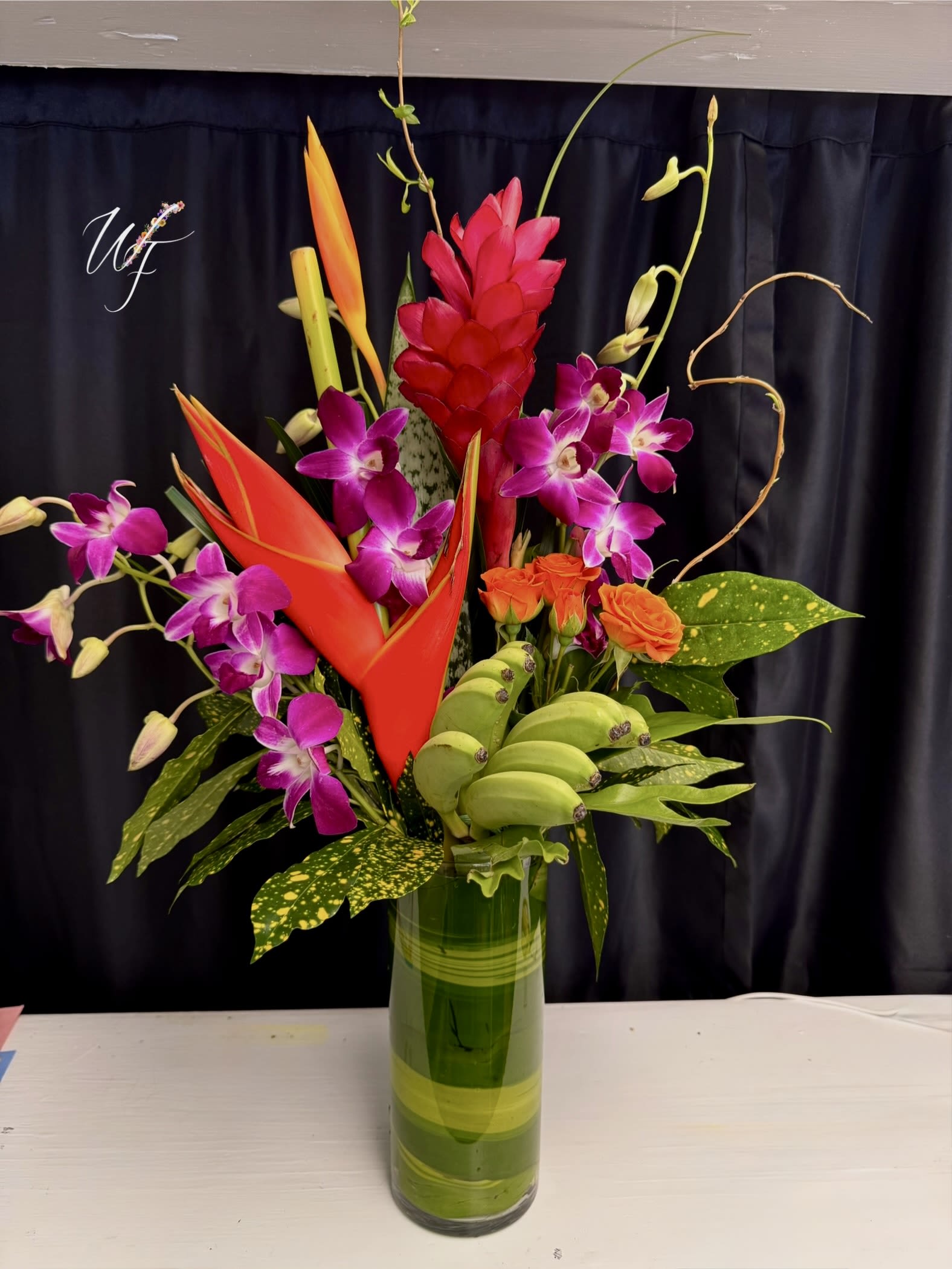 Monkey Jungle - **Tropicals will vary** Vibrant tropical florals designed tall with a sleek modern twist