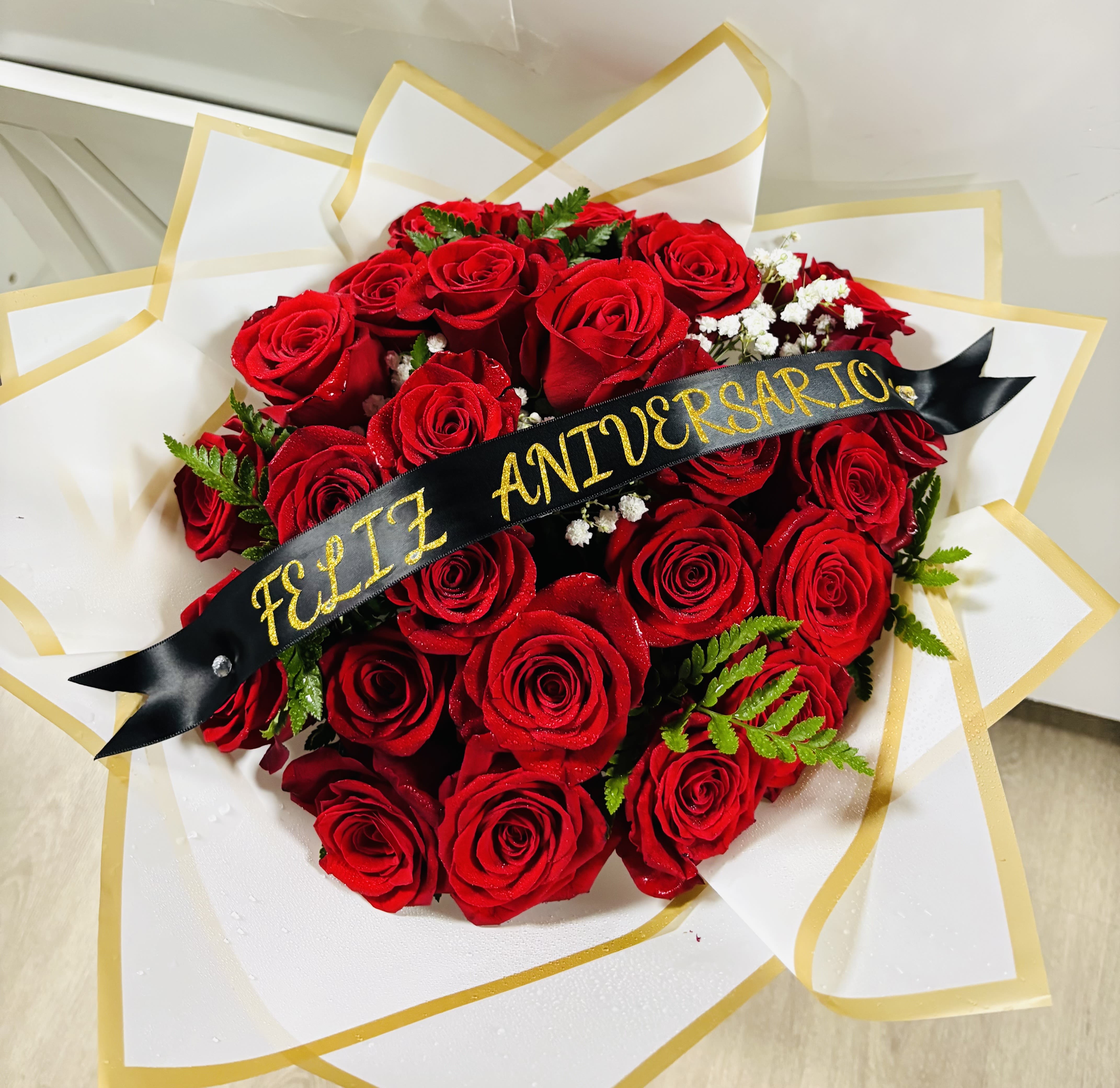 BUCHON BOUQUET  - this is our Classic Ramo Buchon, containing classical Red Roses with Baby's breath all around and Black Sheets to give it an elegant look. Accessories include Butterflies and Diamond Replicas this beautiful bouquet you can choose the color of roses let us know in the instructions or call us (984)343-7199 