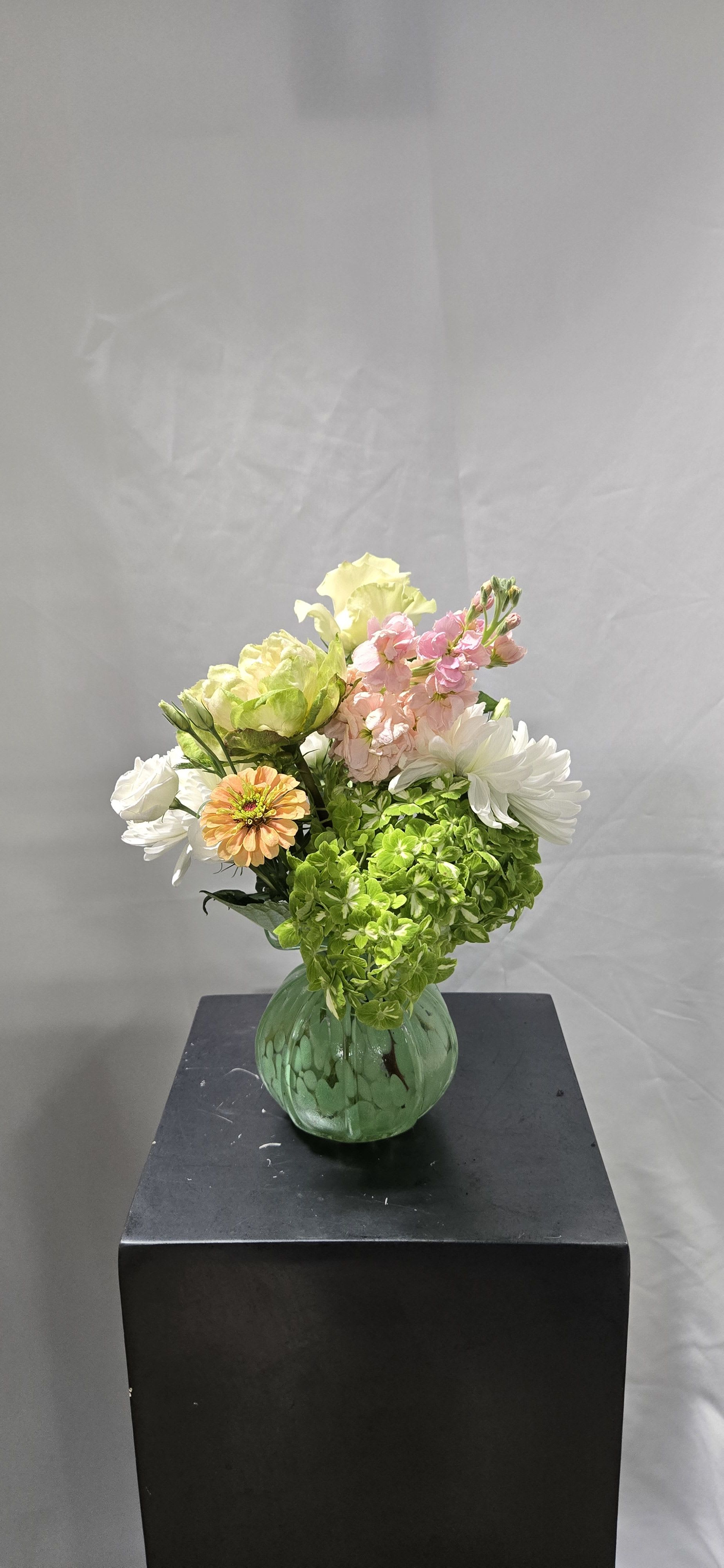 Collectible ruffled edge vase - Collectible ruffled edge vase with seasonal blooms.