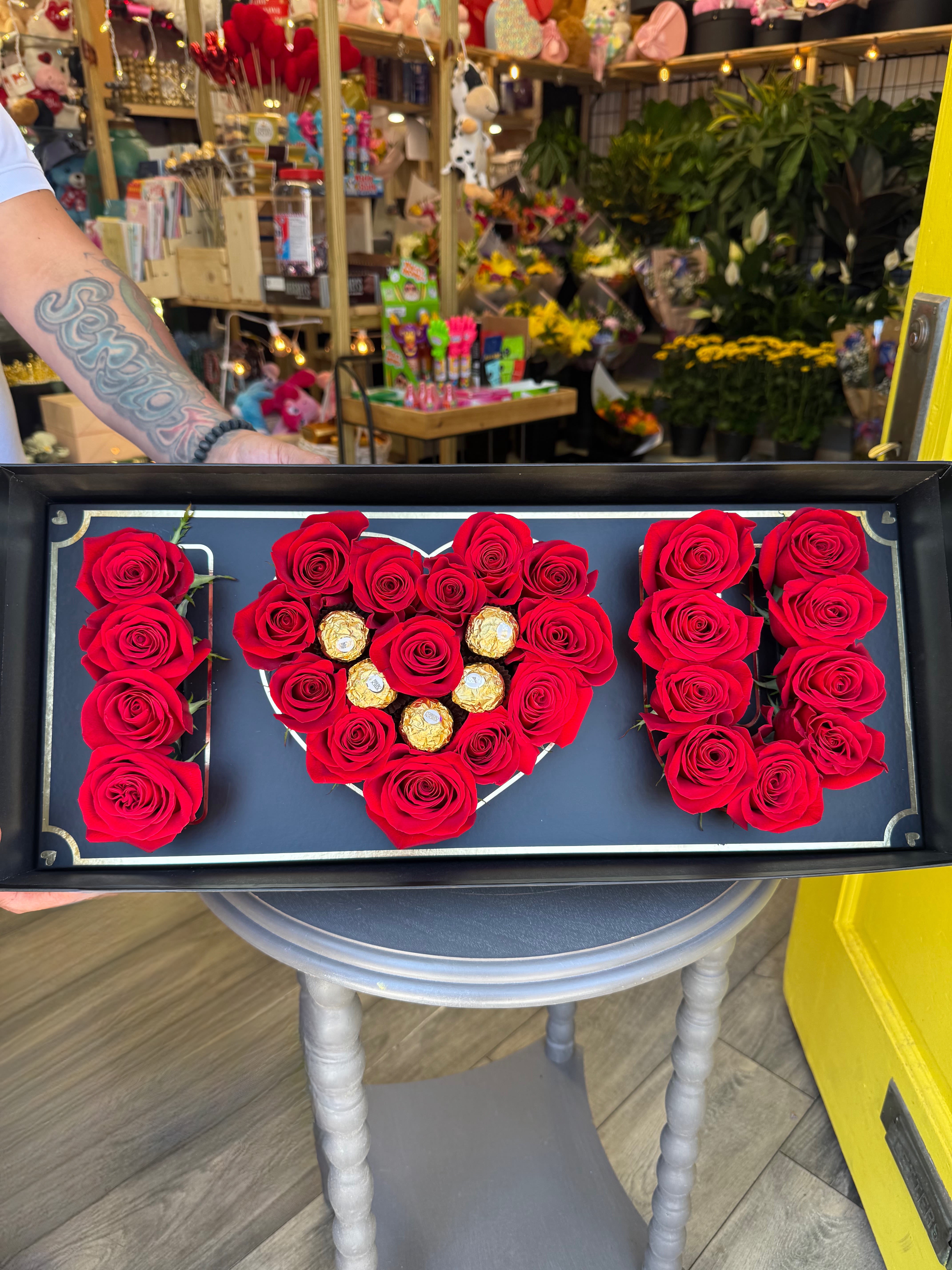 I Heart You Arrangement  - This stunning, one-of-a-kind arrangement is perfect for showing off how much you love a person!   Includes Roses &amp; Ferrero Rocher Chocolate 