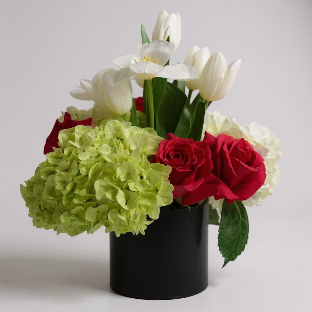 Garden Beauties - This cheerful bouquet brings lighthearted fun to any occasion. Garden Beauties brings you the perfect gift to wish someone a happy birthday, welcome home or to say a BIG THANK YOU!  Vase subject to change 