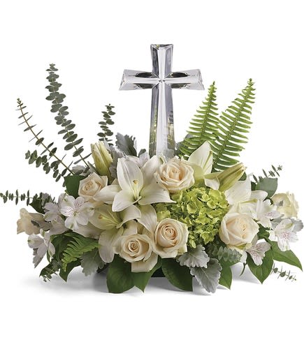Glorious Crystal Cross Floral Arrangment - Send this peaceful bouquet of soft white flowers and green accents with a beautiful message of sympathy. Our unique funeral flower bouquet includes a large crystal cross keepsake.  Your funeral flowers will arrive with green hydrangea, creme roses, white lilies, white alstroemeria are accented with sword fern, spiral eucalyptus, and lemon leaf.  This sympathy delivery includes our Large Crystal Cross Keepsake, approximately 11&quot;H x 6&quot;W x 2&quot;D.  Funeral flowers are approximately 22&quot; W x 18&quot; H.
