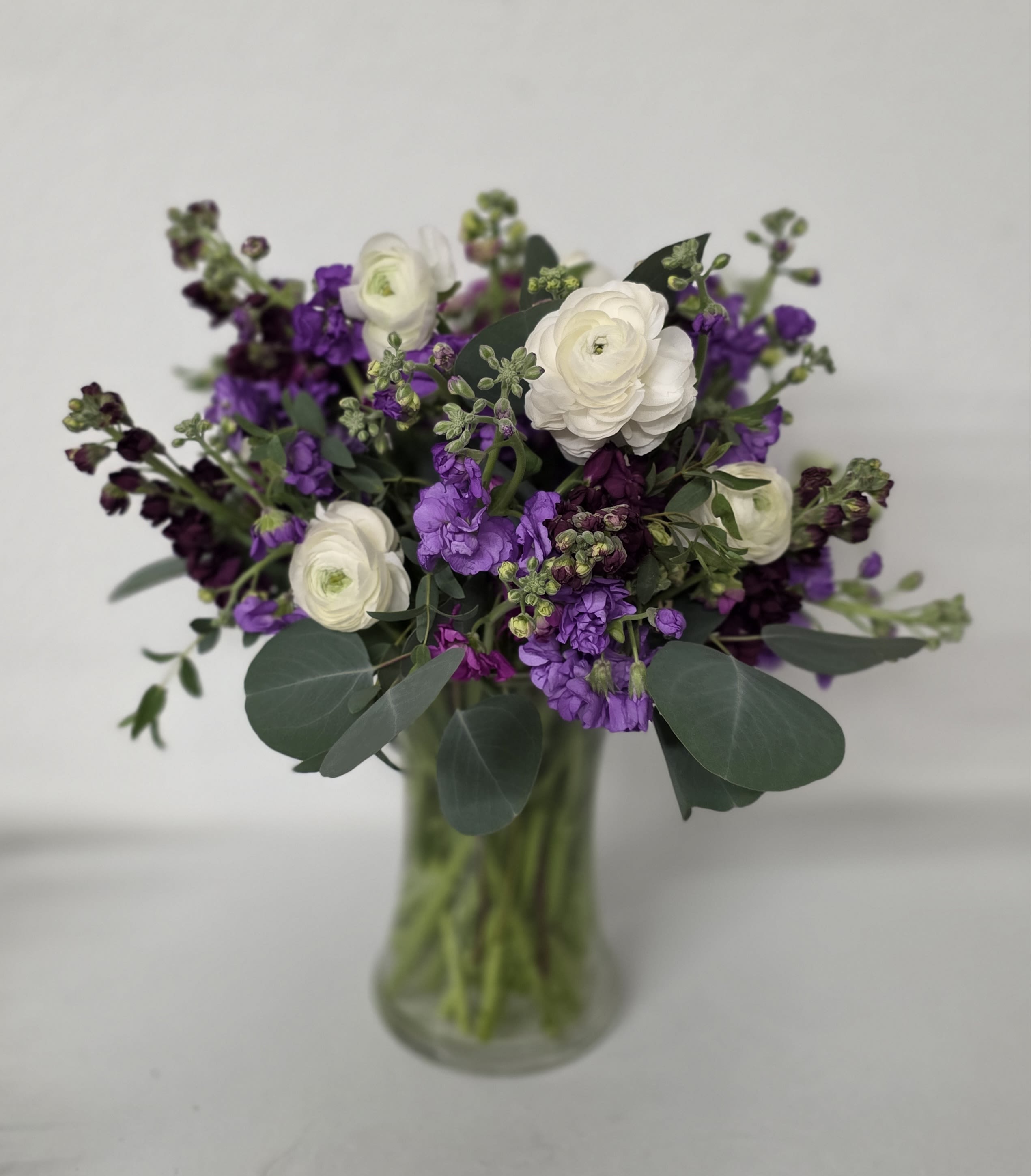 Merry Mel - Merry Mel is a colorful and whimsical arrangement of assorted stock and greenery and ranunculus. The Merry Mel is sure to impress for any occasion. 