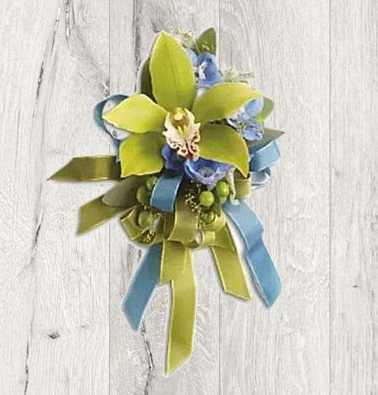Botanical Orchid Wrist Corsage Botanical Orchid Wrist Corsage - A handmade wrist corsage crafted from a green cymbidium orchid and an in-store selection of our freshest accent blooms.