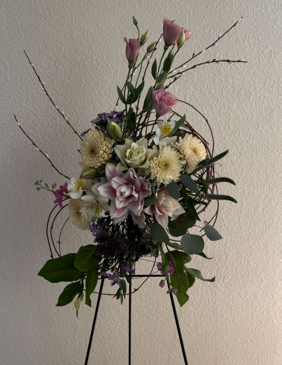 Light and Airy - Simple and elegant spray design on an easel.