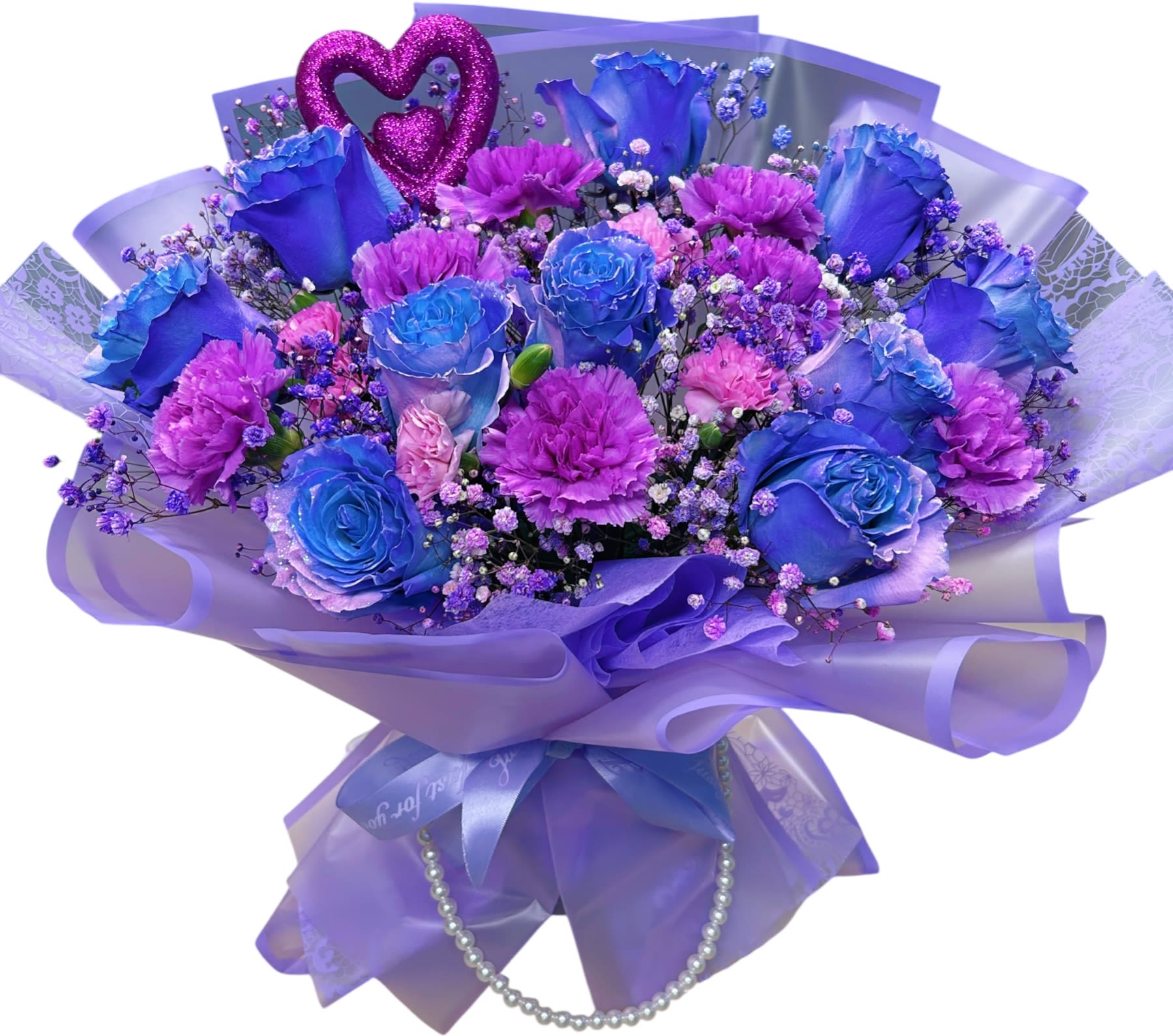 Amethyst Love Amethyst Love - A captivating bouquet featuring stunning blue roses, vibrant purple carnations, and delicate baby’s breath, beautifully wrapped in matching lilac tones. Adorned with a sparkling heart accent, this arrangement radiates elegance, romance, and charm — perfect for expressing love, celebrating special moments, or surprising someone dear.