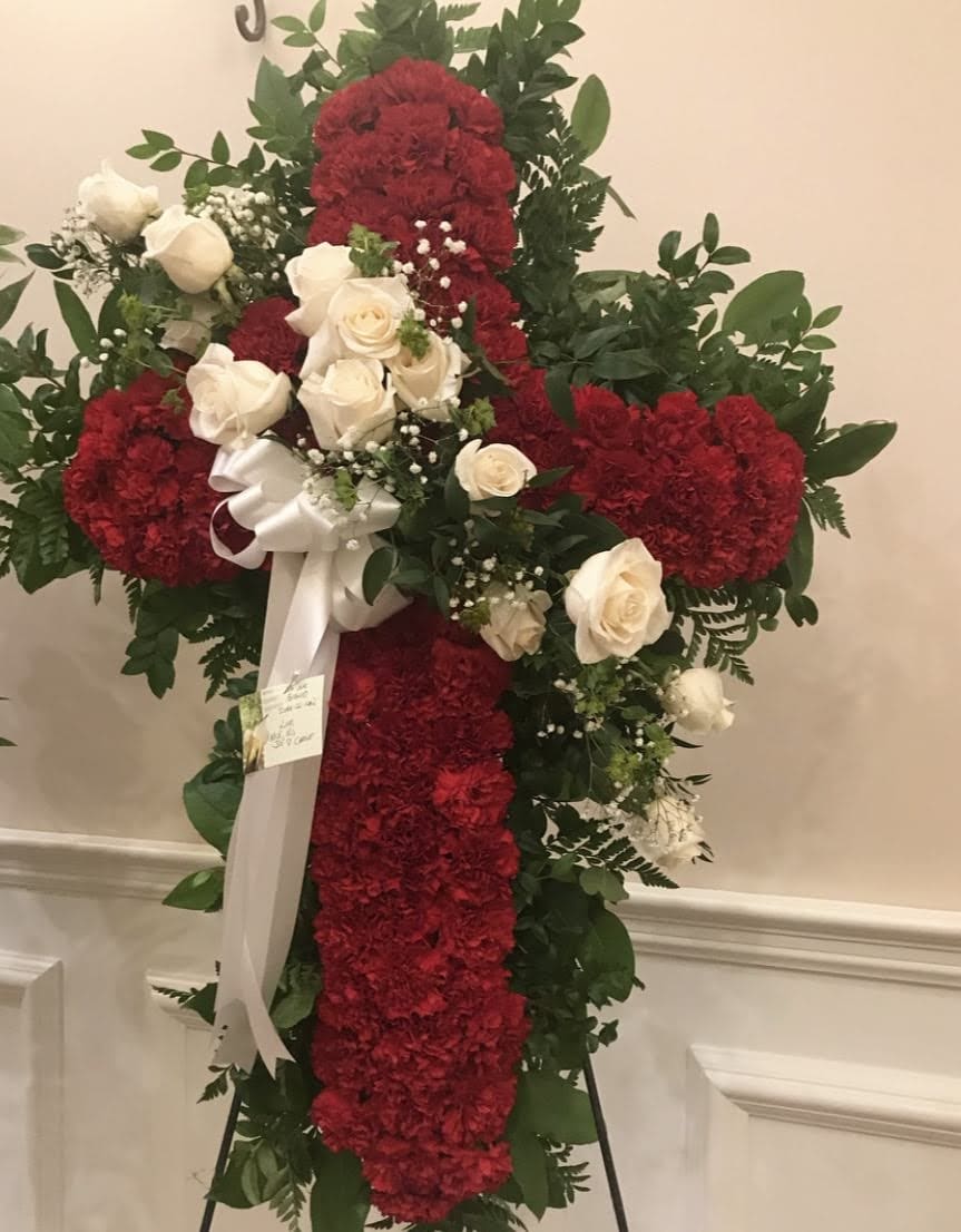 Red Cross Spray Red Cross Spray - A red cross designed beautifully with white roses going through the middle