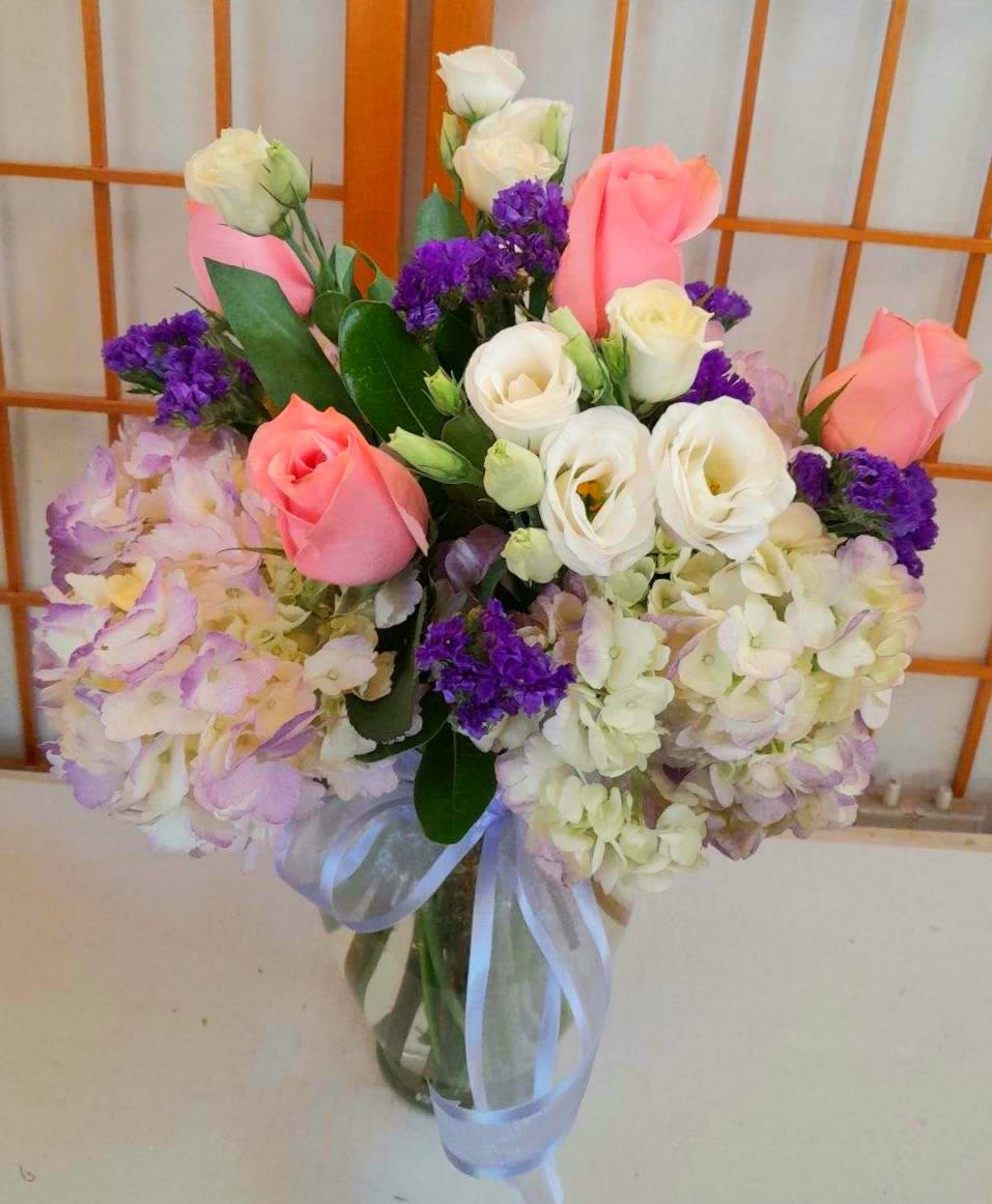 Love At First Sight! - Roses hydrangeas Lisianthus and more in a clear vase, the perfect romantic gift!
