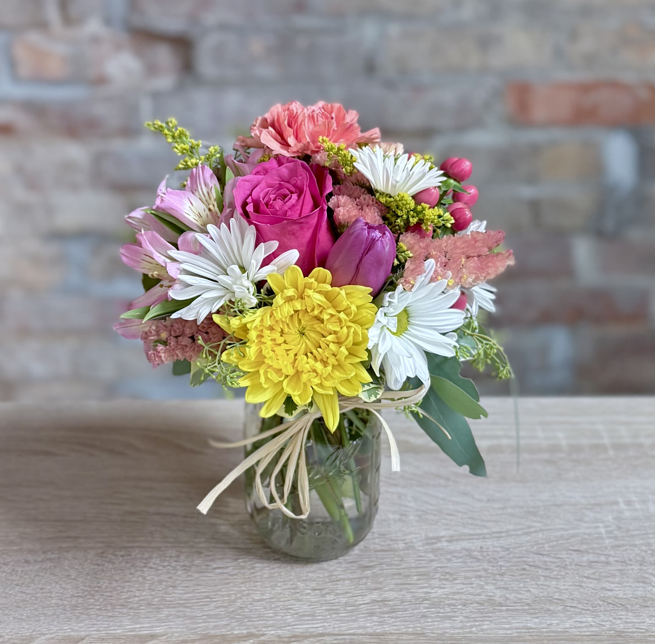 LQ Garden Jar- Summer  - Our classic mason jar arrangement but with brighter summer colors! Yellow, orange, hot pink, and white in a pint size jar. Bright and cheery for any occasion! 
