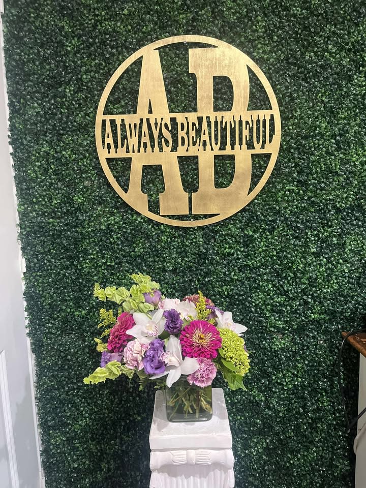 Garden Gala Garden Gala - Bursting with color and charm, Garden Gala is a vibrant celebration of nature’s finest blooms. This lush arrangement blends soft hydrangeas, cheerful zinnias, elegant orchids, and delicate seasonal flowers in a harmonious mix of purples, pinks, greens, and whites. Designed in a clear glass vase to showcase its garden-fresh beauty, it’s perfect for brightening any room, celebrating special occasions, or sending a joyful message to someone you love.