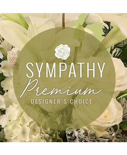 Premium sympathy arrangement Premium sympathy arrangement - Designer's choice of the freshest, most beautiful flowers to show your condolences for the loss of a loved one.