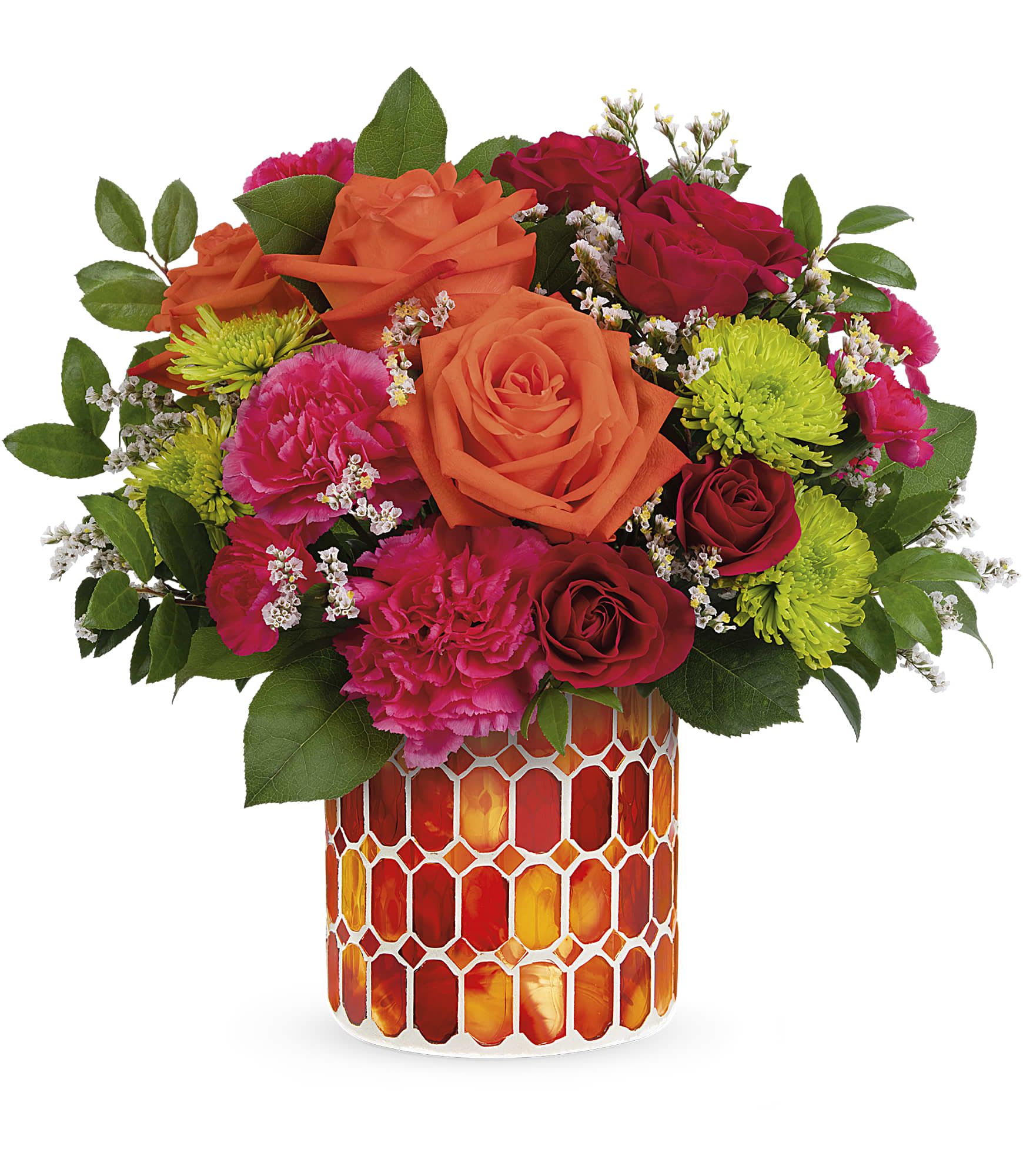 Teleflora's Citrus Dream Bouquet - A dreamy dose of happiness, this beautiful orange and pink bouquet looks its best in this stunning stained glass mosaic vase. Orange roses, hot pink carnations, hot pink spray roses, green cushion spray chrysanthemums, white limonium and miniature hot pink carnations are arranged with lemon leaf and huckleberry. Delivered in Teleflora's Autumn Radiance Mosaic vase.