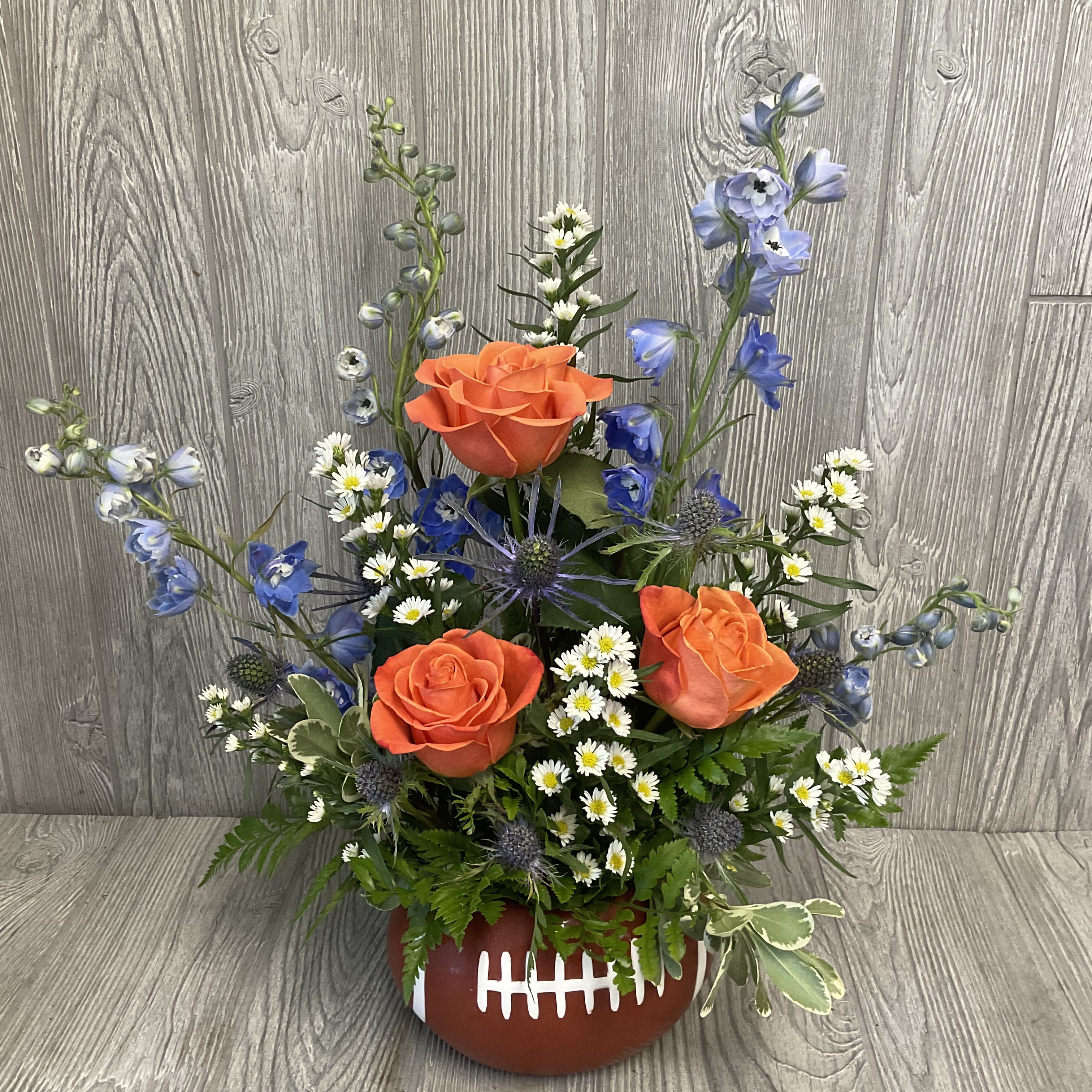 Touchdown - TOUCHDOWN ! Fresh cut floral arrangement perfect for your favorite football fanatic! Flowers may vary. 