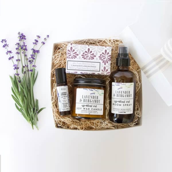 Little Flower Soap Co - Lavender Bergamot Home and Gift Box - This is a box full of relaxation including Room Spray, Soap, Candle and Aromatherapy roll on. All are a blend of lavender and bergamot essential oils to make you and your home smell like lavender field. SET INCLUDES - 3.7 oz Room Spray - 4 oz Soy wax candle - 10.3 ml aromatherapy roll on - 3.5 oz Lavender Lemongrass Soap - White gift box measures 6x6x4&quot; - Organic cotton ivory and grey stripe ribbon
