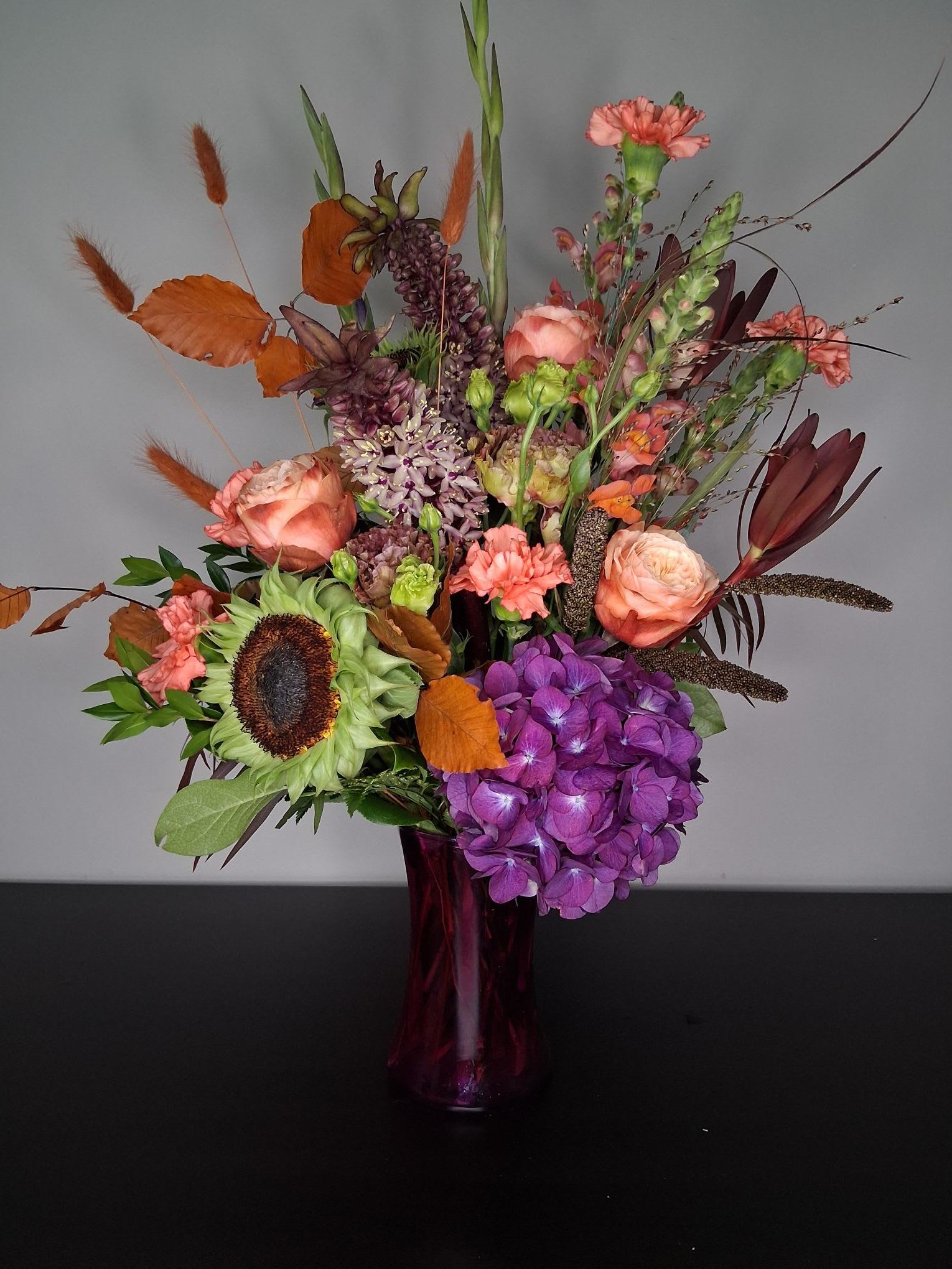 Autumn Twilight - That last moment right before the sun fully sets it lights up the sky in hues of oranges purples and the last gleam of golden sun. The colors and the turn of the seasons inspired this creation. rich rusts and oranges compliment the deep purples and earthy tones. 