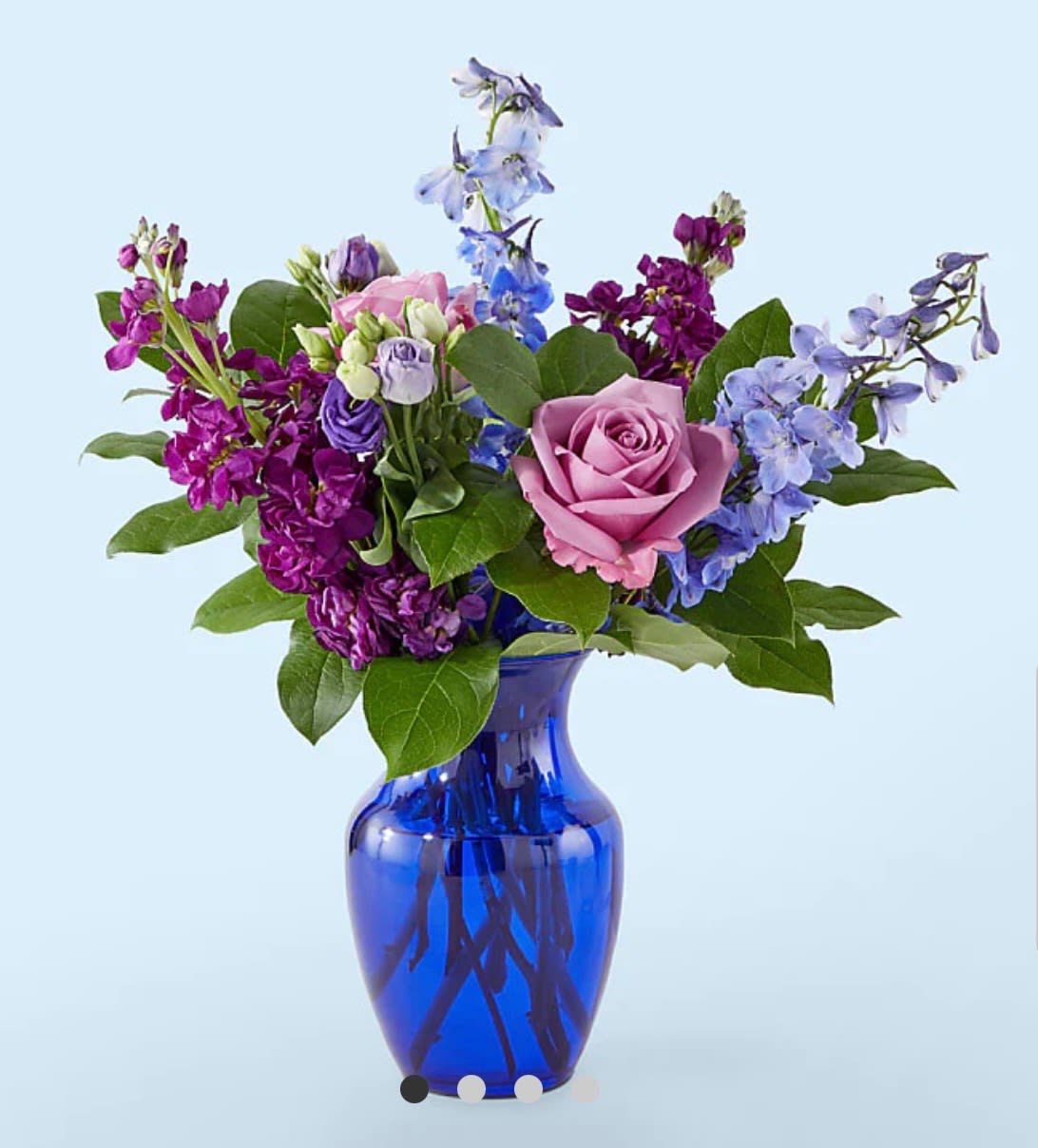 Twilight Glow Bouquet - Capturing the dreamy feel of dusk, this artful mix of blue and purple stems will voice a congratulations, happy birthday, or thinking of you magically.