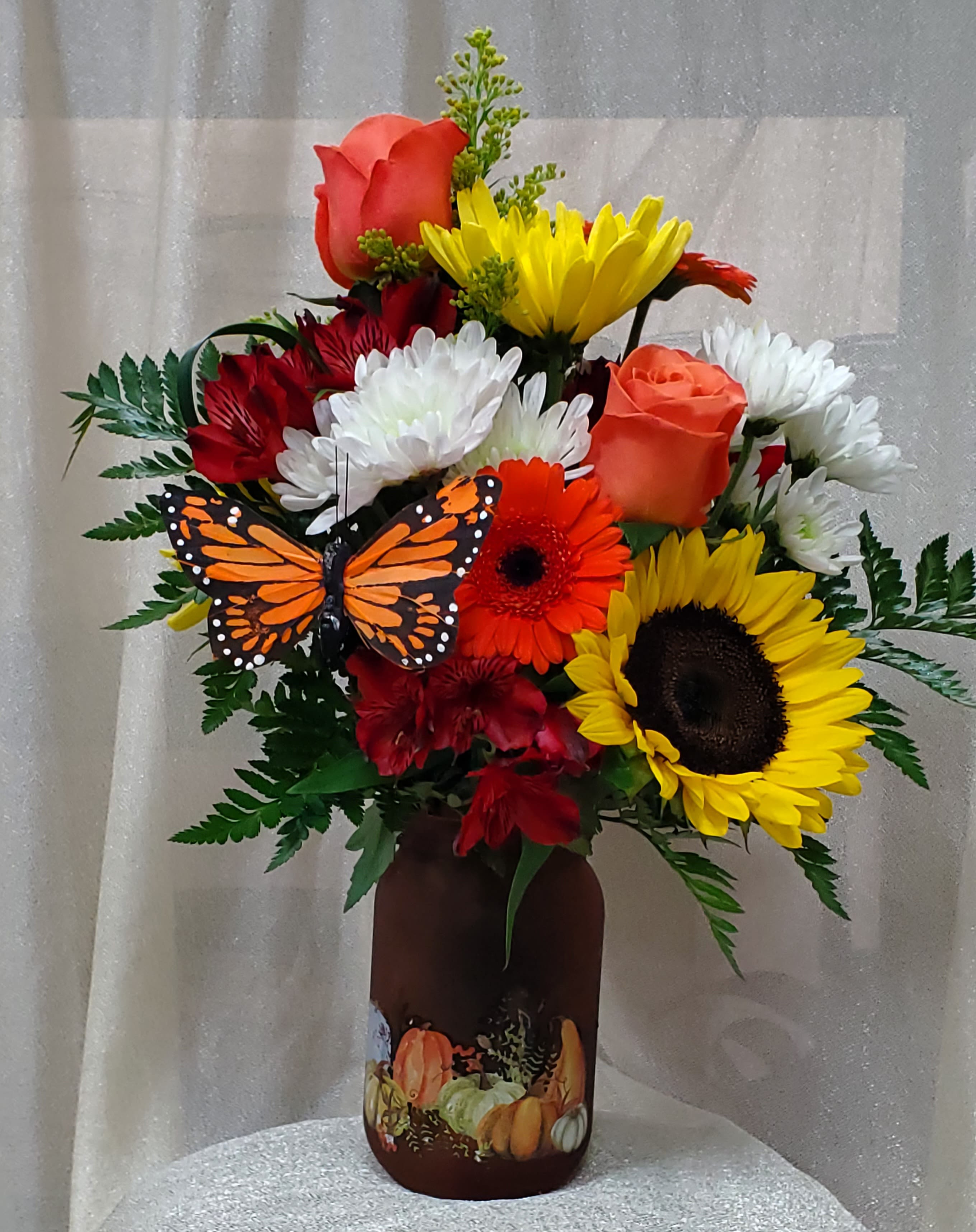 Happy Fall Y"all Happy Fall Y"all - Fall is here! Send this colored glass vase accented with pumpkins and gourds to someone this season. A fresh selection of yellow, red, orange and white to add to the beauty of the season.