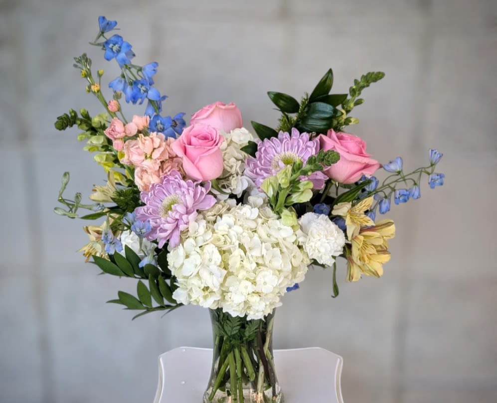 Art &amp; Flowers Exclusive &quot;Diamond Love&quot; - A giant luxury arrangement? Sign us up. Instead of sending standard red roses only, send them something soft and pretty and sweet to say &quot;I care&quot;. We will use a seasonally fresh assortment of blooms in soft pastel tones. Vase shapes and sizes will vary depending upon the size design you choose.   The floral content may vary due to seasonal availability. We do offer this in 3 sizes. 