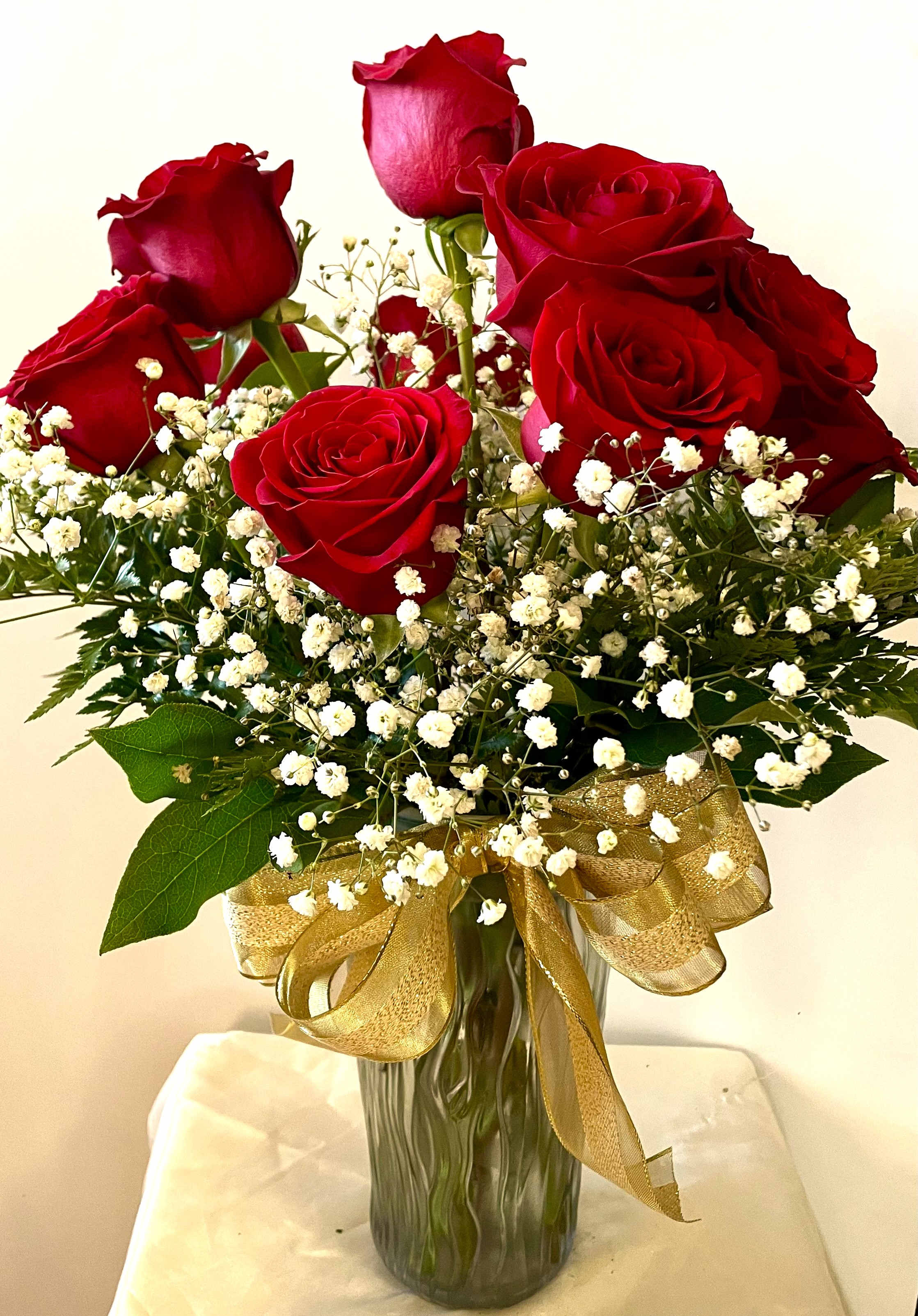 One Dozen Red Roses One Dozen Red Roses - For classic romance, a dozen red roses is always the perfect choice. Available at this special price for a limited time!