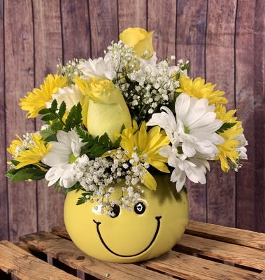 Have a Nice Day Bouquet Have a Nice Day Bouquet - A bright, fun arrangement of white and yellow daisies and yellow roses designed in a yellow ceramic bowl featuring the classic smiling face. A great way to lift the spirits!