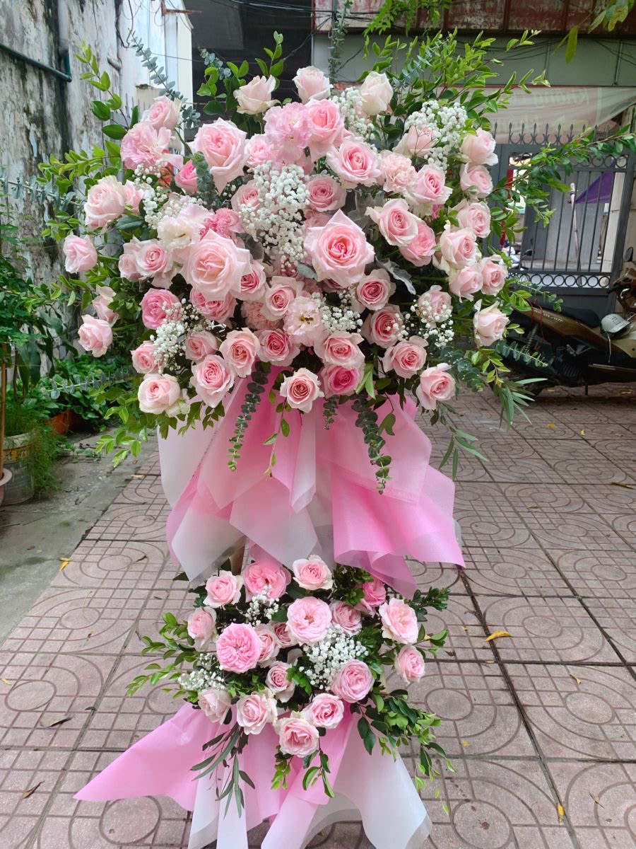 Grand opening floral arrangement Grand opening floral arrangement - Grand openin floral arrangement , floral arrangement with pink and lavender tones , on 2 floral floors providing elegance and distinction , covered with pink wrapping paper , available every day