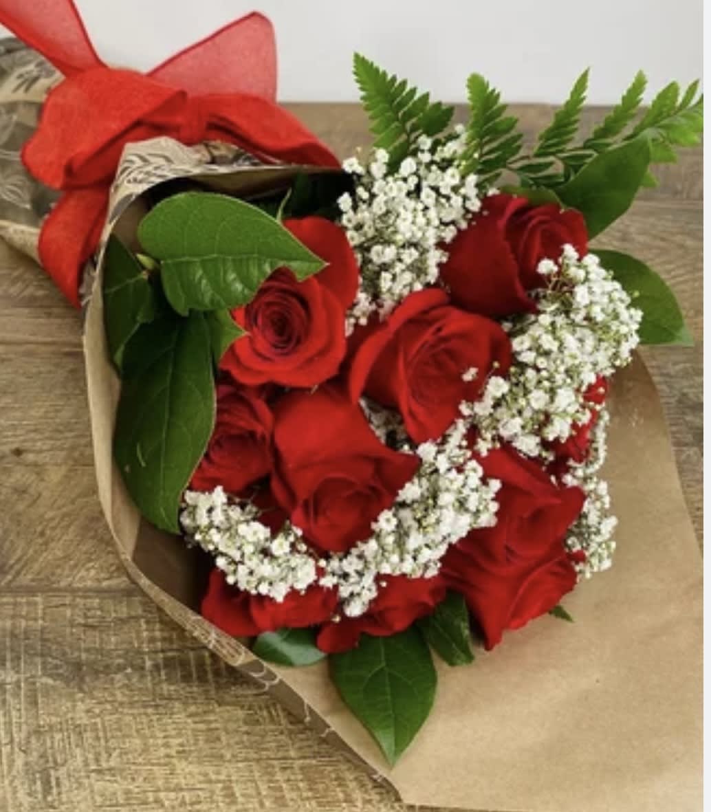 Roses, wrapped - standard price includes a dozen roses wrapped and beautifully presented ready to be cut and arranged in your own vase. If no color choice is specified in &quot;special instructions&quot; we will default to RED as your selection. 