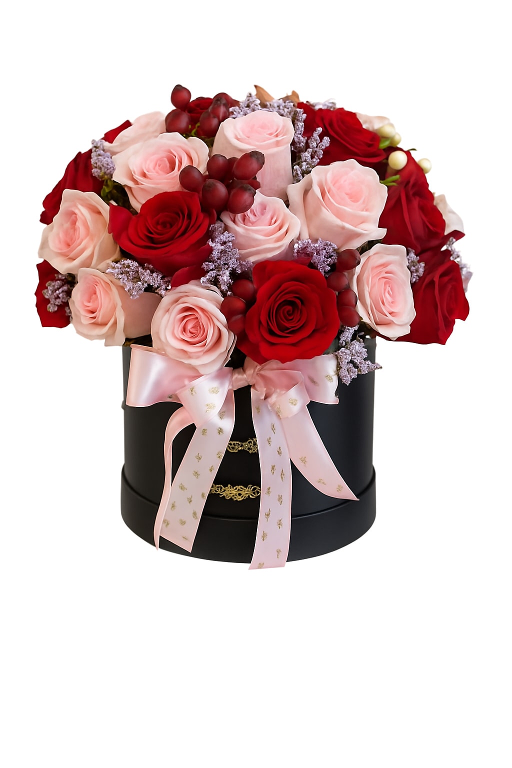 Romance in Bloom” Rose Hatbox Arrangement Romance in Bloom” Rose Hatbox Arrangement - Romance in Bloom” Rose Hatbox Arrangement The “Romance in Bloom” arrangement is a luxurious blend of elegance and passion, perfect for celebrating love in its most beautiful form. Featuring a harmonious mix of deep red roses and soft blush pink roses, this bouquet is accented with red hypericum berries for texture and charm.