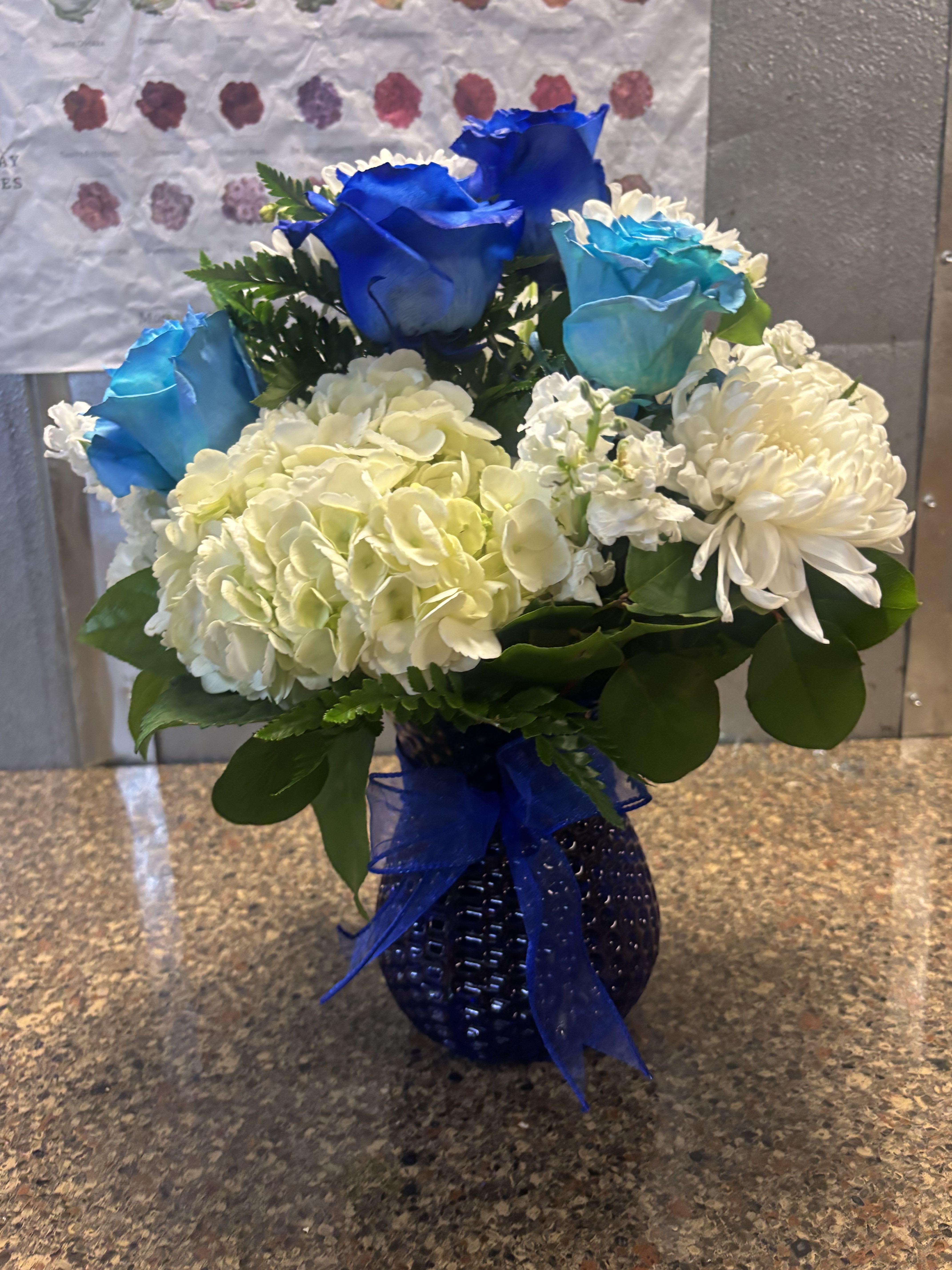 Lovely Blue - fresh white and blue flowers with hydrangeas daisies and blue roses 