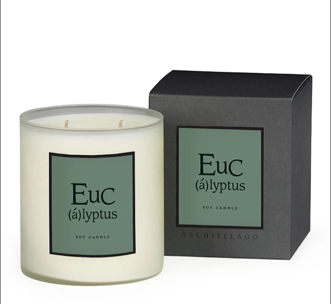 Eucalyptus Boxed Candle Eucalyptus Boxed Candle - Create a spa-like atmosphere in your favorite space with our Eucalyptus Boxed Candle. Each candle is made with a premium wax blend that is infused with Eucalyptus, Fir Needles, Grapefruit, Green Apples, and Rose Petals to create a zen-like fragrance that will help you feel relaxed and rejuvenated. This gently hand-poured candle has two safe, lead-free cotton wicks. For best results: trim wicks to ¼ of an inch before every use. Approx 90 hr burn time. Boxed and package in gift bag with tissue paper and ribbon.
