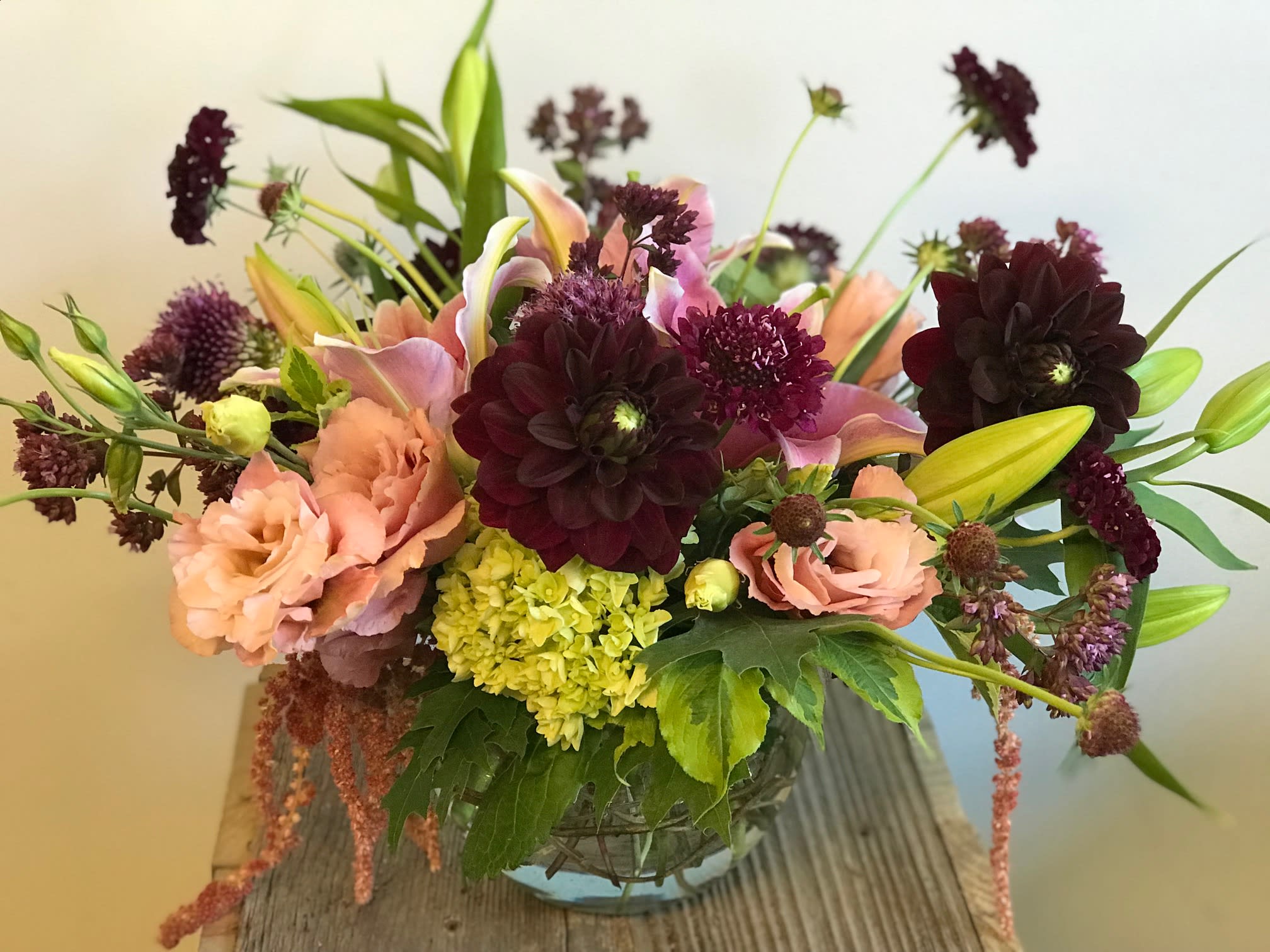 Summer's Delight Summer's Delight - A lush and bountiful mix of locally grown seasonal blooms. Pease Note: Color palette and flower varieties may vary due to what is available and freshest but the overall arrangement will keep the same aesthetic.