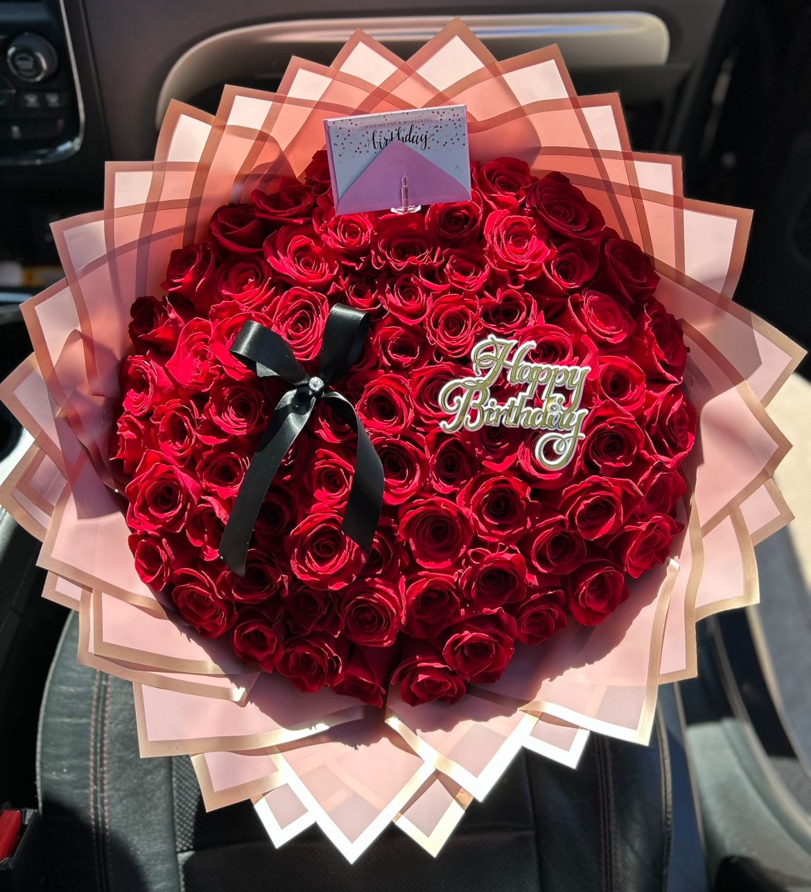 50 Rose Ramo Buchon  - 50 rose count bouquet, wrapped ramo buchon style.