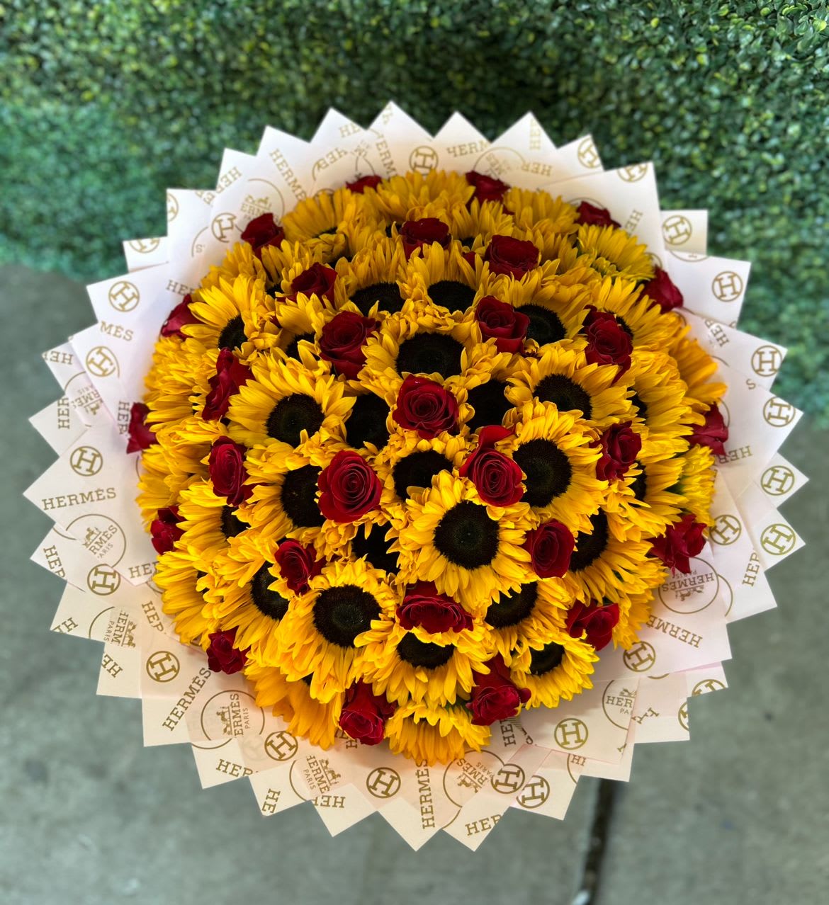 MEGA Sunflower bouquet with hints of roses  - Sunflower bouquet with peekaboos of red roses. Designer choice pink paper. 