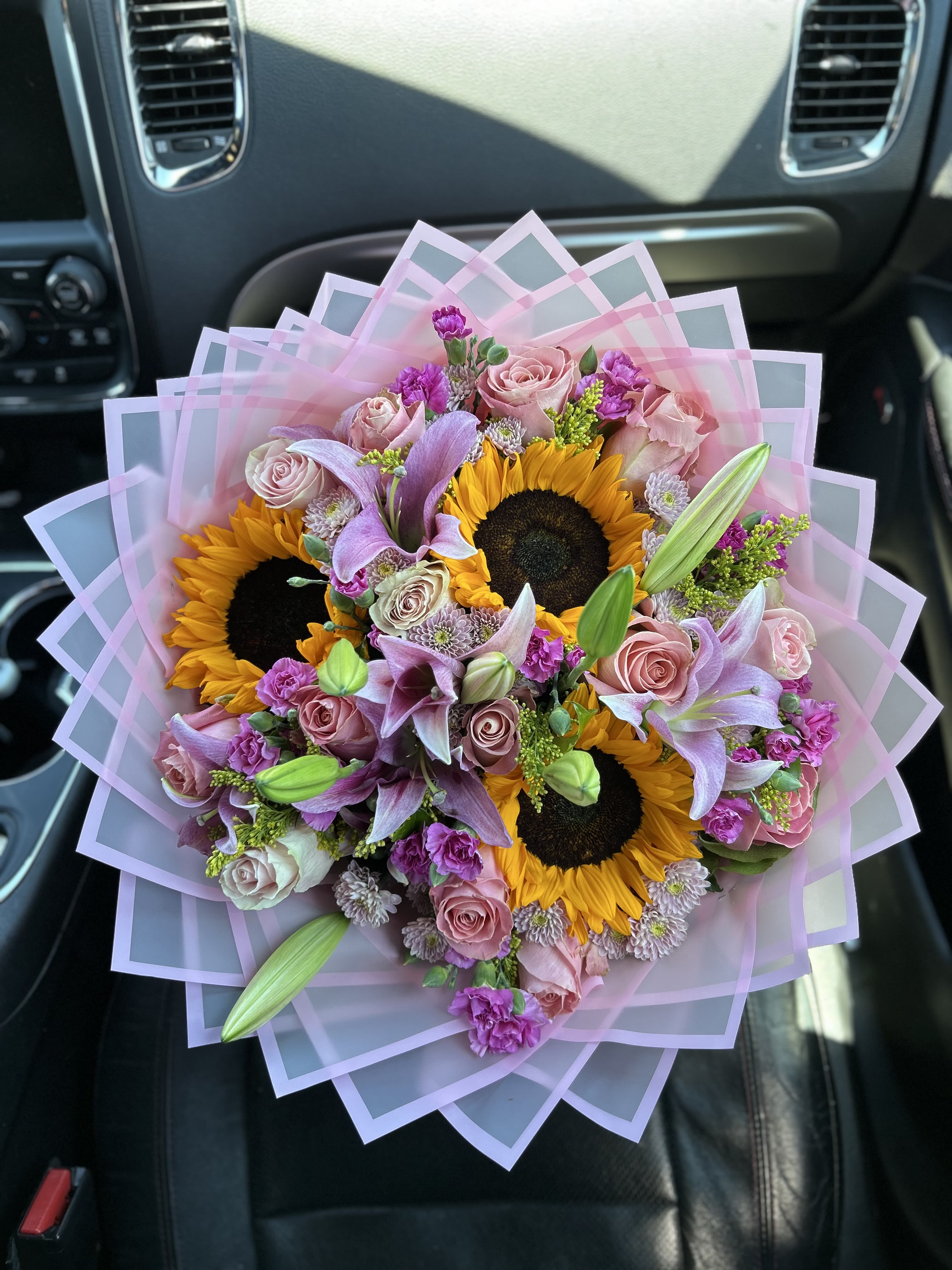 Premium Mixed Bouquet - Designer choice of mix of pinks, including roses, Lily’s, sunflowers, pompom and carnations.