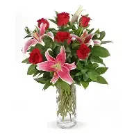 Roses and Lilies arrangement Roses and Lilies arrangement - Beautiful deep roses and greenery plus baby breath
