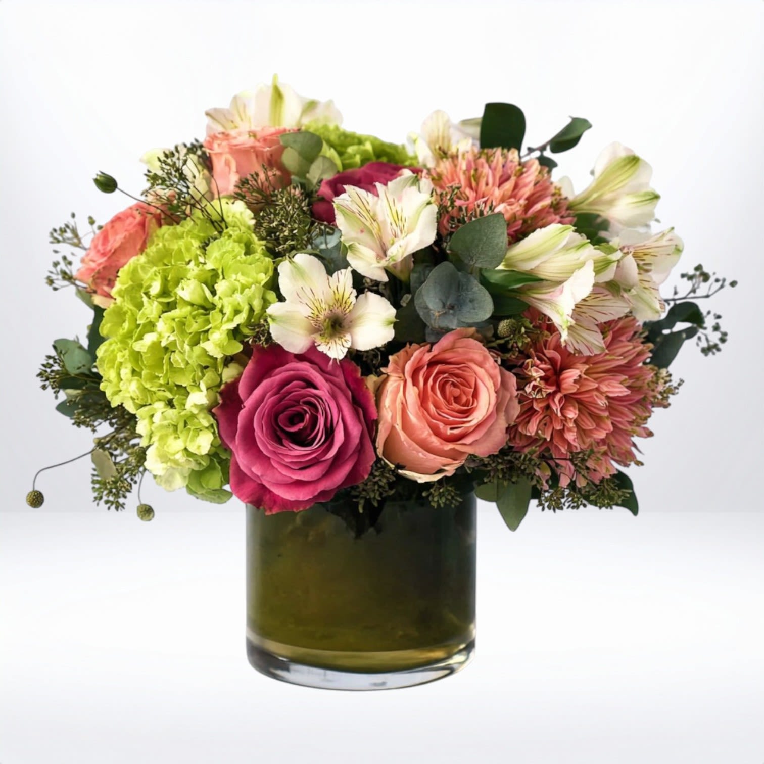 Coral Meadow Coral Meadow - Bursting with vibrant peach and coral roses, lush green hydrangea, soft ivory alstroemeria, and seasonal accent blooms, this arrangement is designed in a sleek glass vase for a polished yet natural look. Perfect for birthdays, anniversaries, thank-you gifts, or simply brightening someone’s day, this bouquet captures the warmth of a summer garden with a modern twist. Same-day flower delivery available in Galveston and the surrounding areas. Substitution Disclaimer: Due to seasonal availability and our commitment to the freshest blooms, occasional substitutions may be made. Any replacements will maintain the color scheme, style, and value of your selected arrangement.