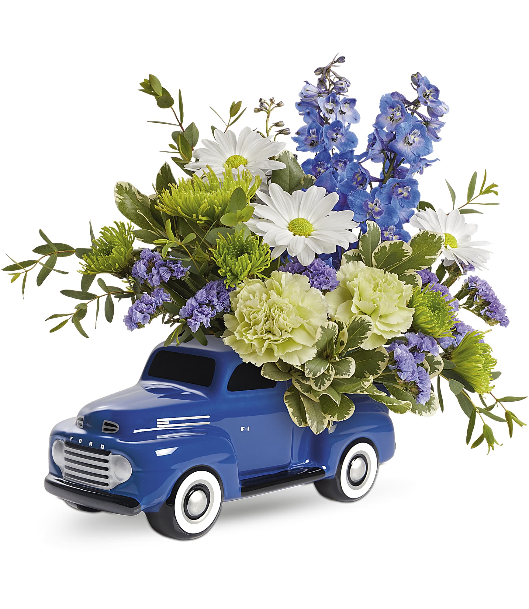 Teleflora's Enjoy the Ford Bouquet - Bursting with a whimsical blue, white and green bouquet, this fun-filled ceramic Ford delivers smiles across the miles! This arrangement features white roses, green carnations, blue delphinium, white daisy spray chrysanthemums, green cushion spray chrysanthemums, blue sinuata statice, variegated pittosporum and parvifolia eucalyptus. Delivered in Teleflora's '48 Ford Pickup Keepsake.