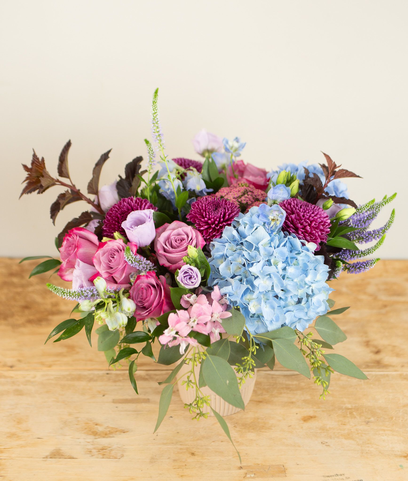 Berry Luxe  - Lush and gorgeous summer flowers including hydrangea, roses in vibrant berry tones.  Flower choices will vary based on seasonality. A gorgeous gift! Approx 14&quot;x14&quot;  