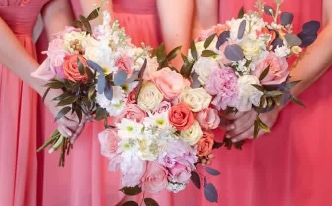 Romantic Bloom - The &quot;Romance in Bloom&quot; bouquet artfully combines roses, carnations, and daisies with eucalyptus accents, embodying the essence of romantic elegance and vibrant charm.