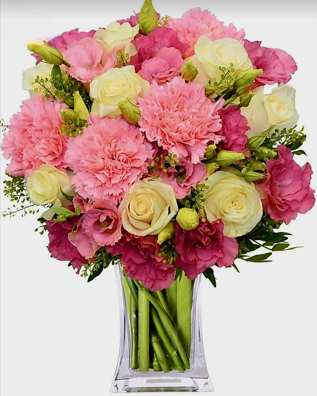 Carnations Galore by Pretty in Petals Carnations Galore by Pretty in Petals - A vibrant and cheerful arrangement bursting with the timeless beauty of carnations. This "Carnations Galore" is a delightful explosion of color, perfect for adding a touch of warmth and elegance to any occasion. The arrangement features a generous abundance of carnations in various shades, creating a stunning display that is sure to impress.