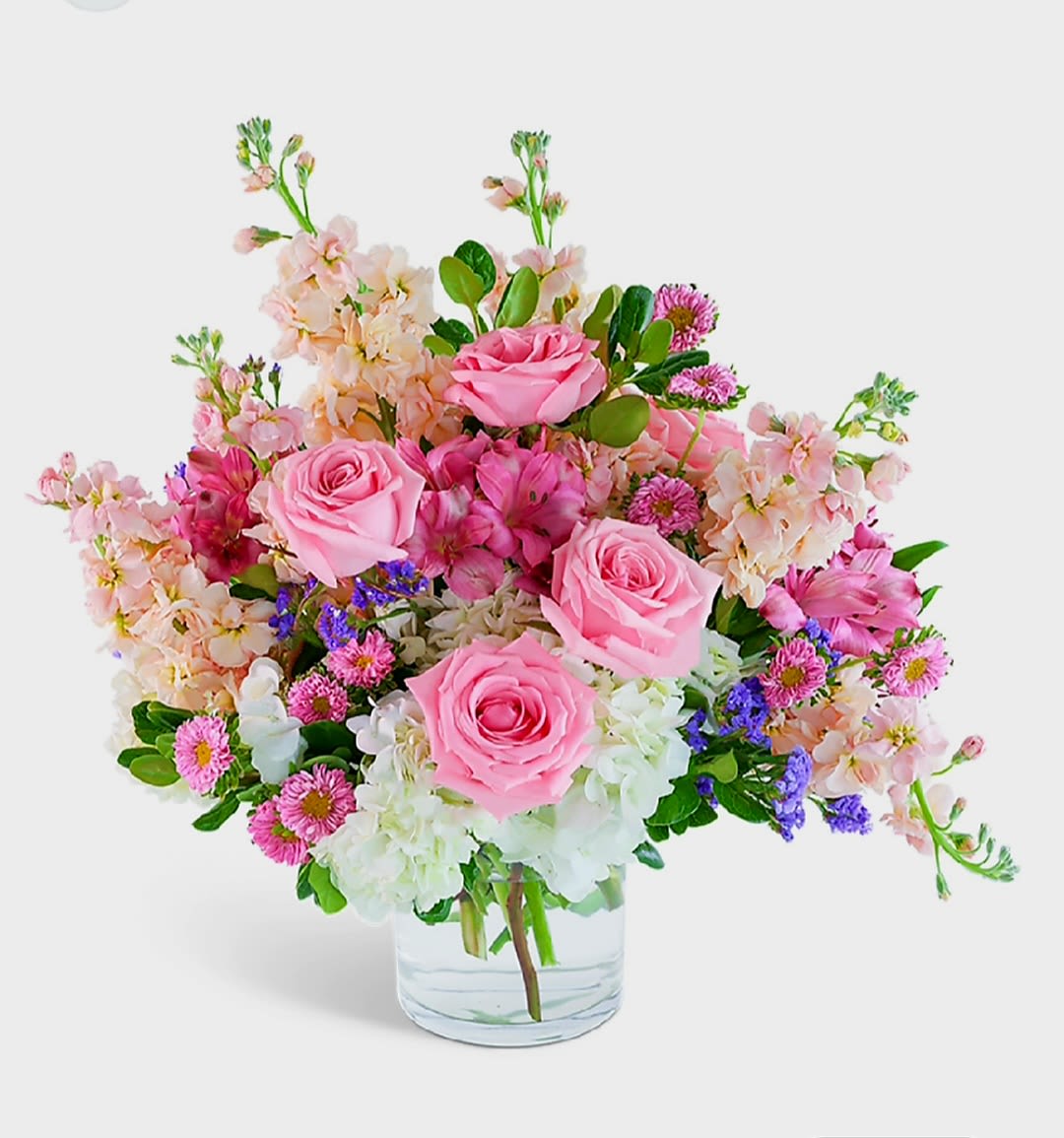 Pink Romance by Pretty in Petals  - Pink Romance: A flower arrangement with mixed flowers that can be arranged in a bunch, in a vase, or in a box. These are ideal flowers for expressing feelings of love or romance.