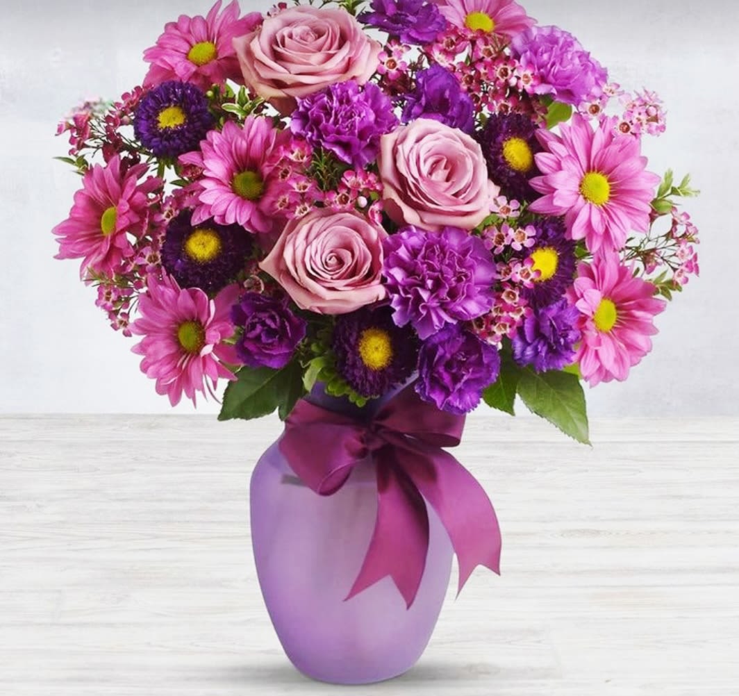My Violet by Pretty in Petals  - My Violet: A delightful mix of purple flowers that symbolize admiration, loyalty, and devotion. This arrangement is perfect for expressing any of these feelings to someone special in your life.