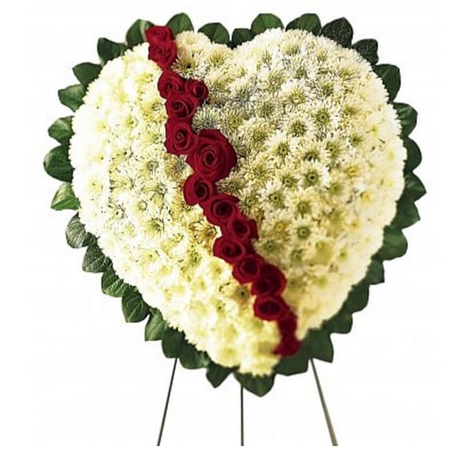 BROKEN WHITE HEART BROKEN WHITE HEART - A WHITE HEART OF MUMS WITH A CRACK OF RED ROSES
