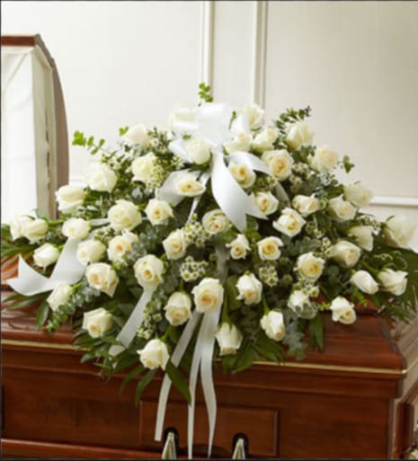 DRAPING IN WHITE DRAPING IN WHITE - WHITE ROSES FOR THE CASKET