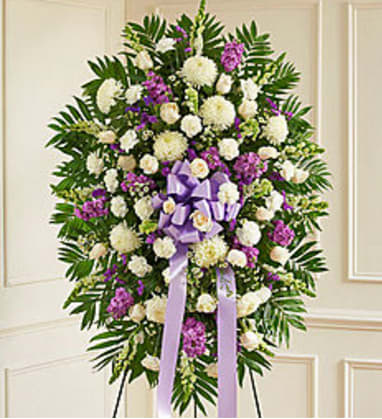 White & Lavender Spray White & Lavender Spray - LAVENDER AND WHITE FLOWERS ON AN EASEL SPRAY FOR THE WAKE AND SERVICE