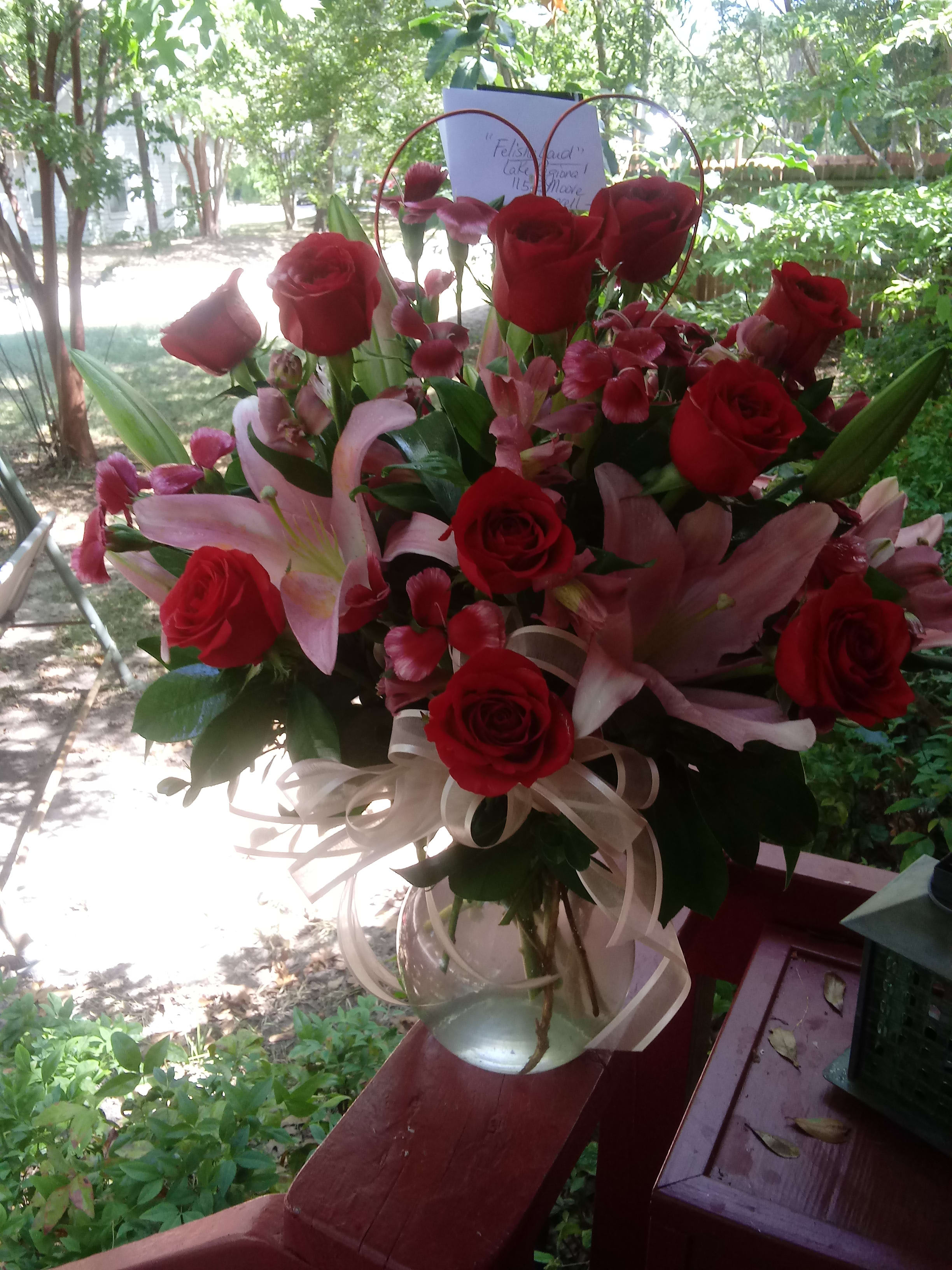 "Love Of My Life" "Love Of My Life" - Red roses and pretty pink lillies with filler flowers is always a lovely way to show the love of your life how much they mean to you ❤️