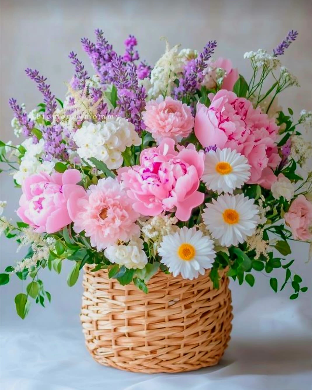 Breeze by Pretty in Petals Breeze by Pretty in Petals - This breeze arrangement is a beautiful mix of light colors with white and baby blue roses in the front to make it seem like a beautiful ocean scene with dark purple irises in the back to represent the sky.